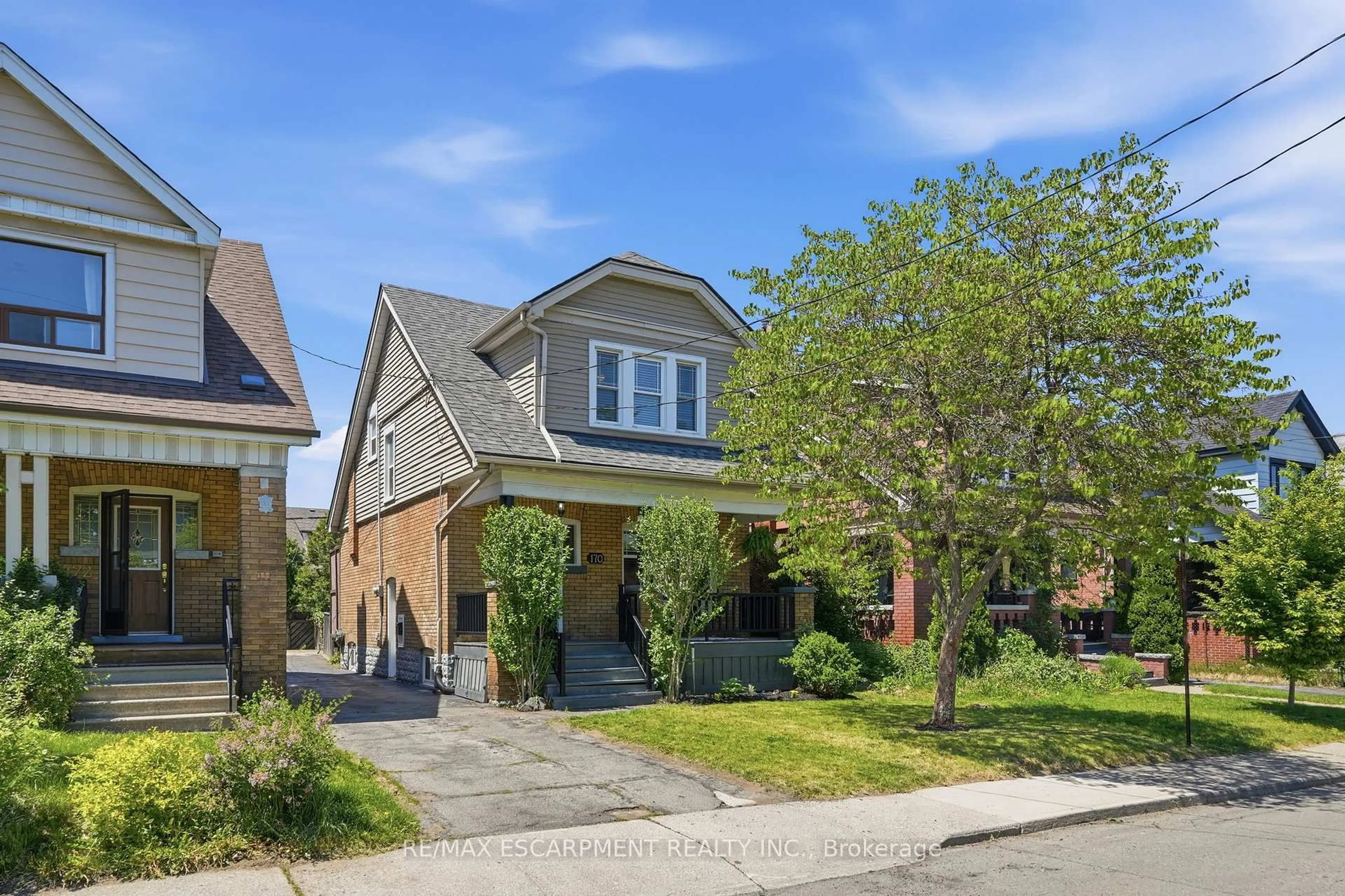 Home with brick exterior material, street for 170 Kensington Ave, Hamilton Ontario L8M 3H5