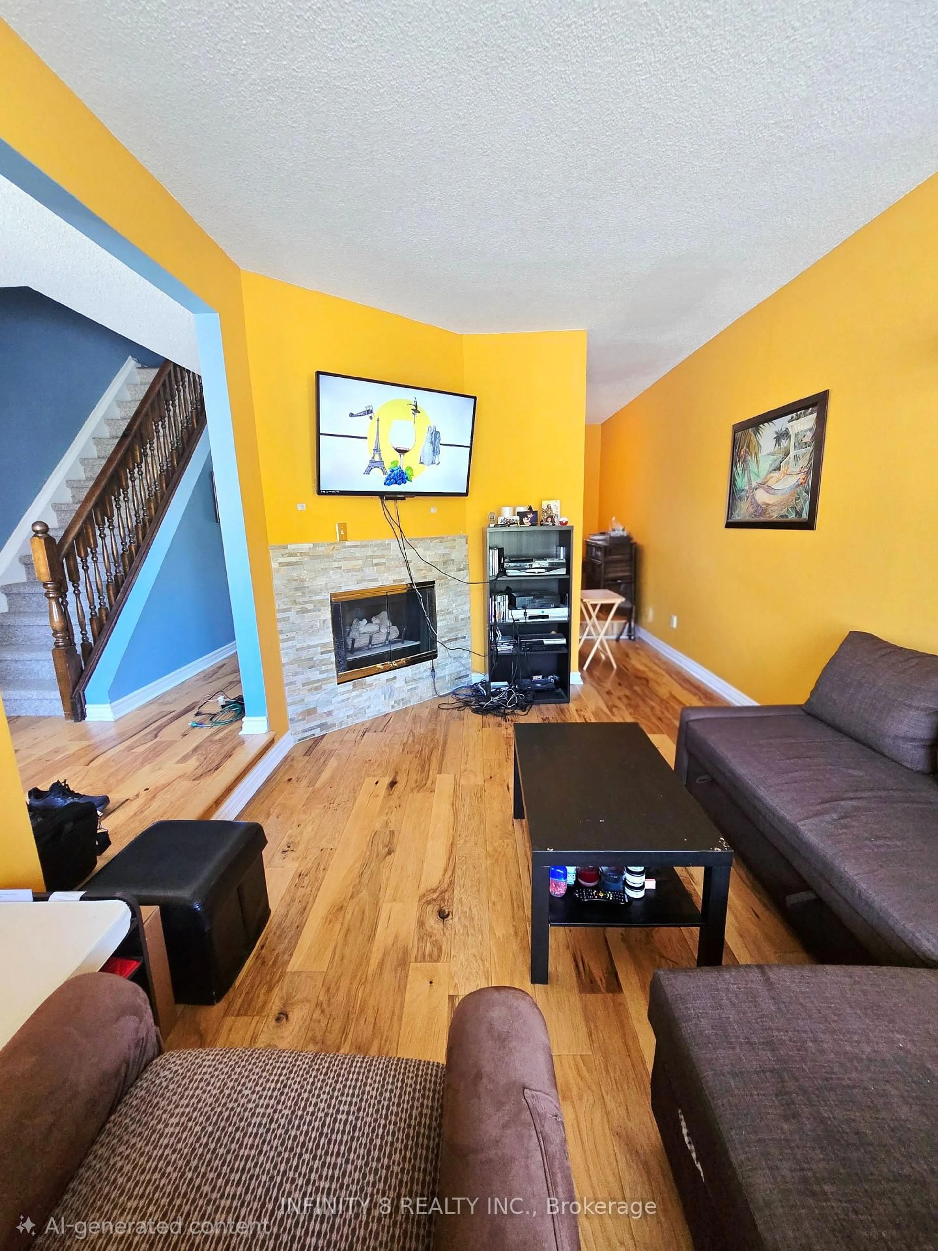 Living room with furniture, wood/laminate floor for 6910 Kalar Rd #12, Niagara Falls Ontario L2H 2T7
