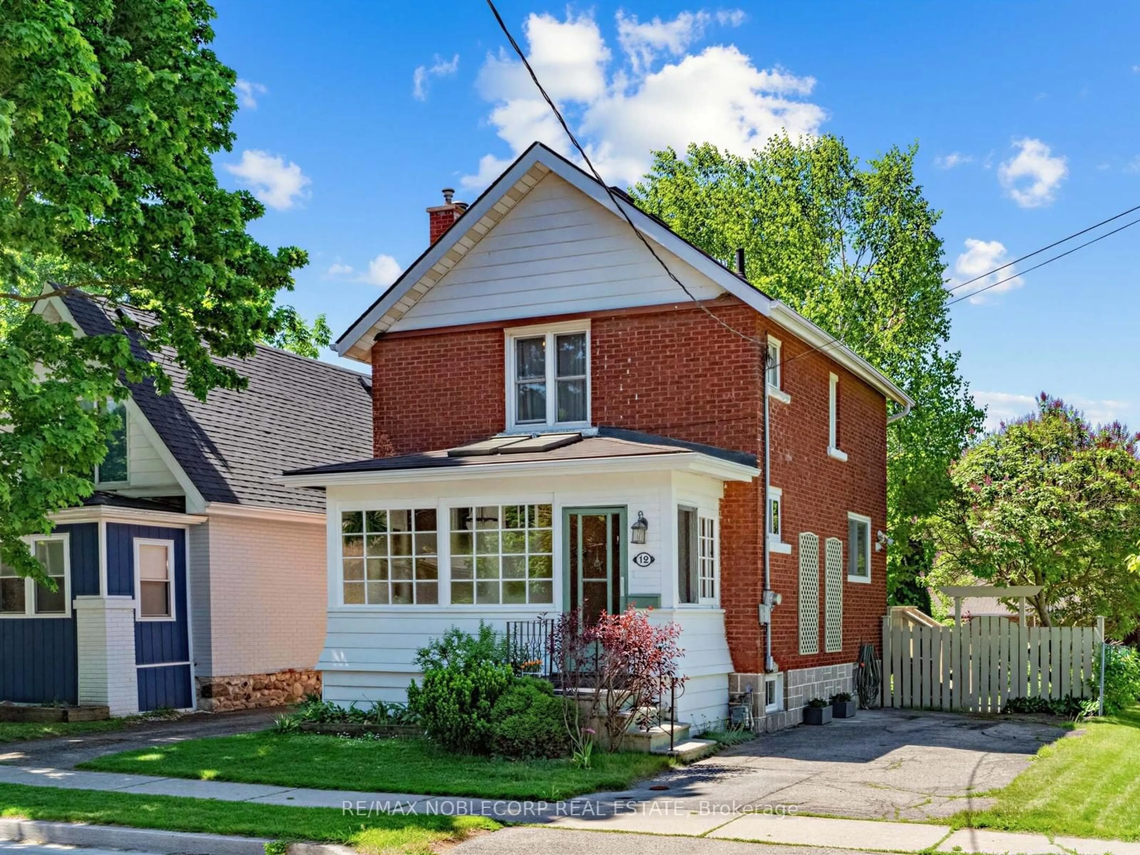 Home with brick exterior material, street for 12 Bagot St, Guelph Ontario N1H 5S9