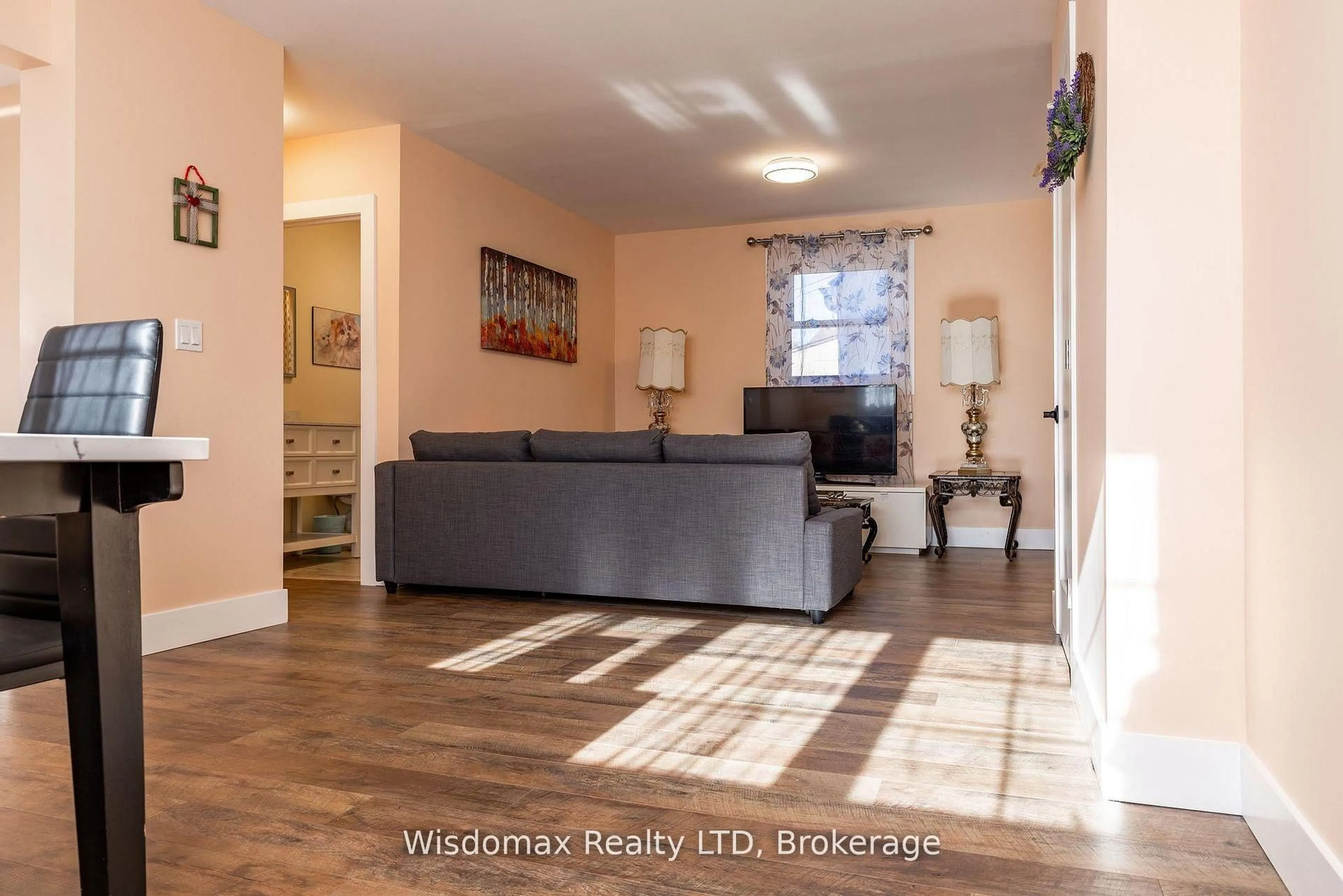 Living room with furniture, unknown for 5291 STAMFORD St, Niagara Falls Ontario L2E 1N2