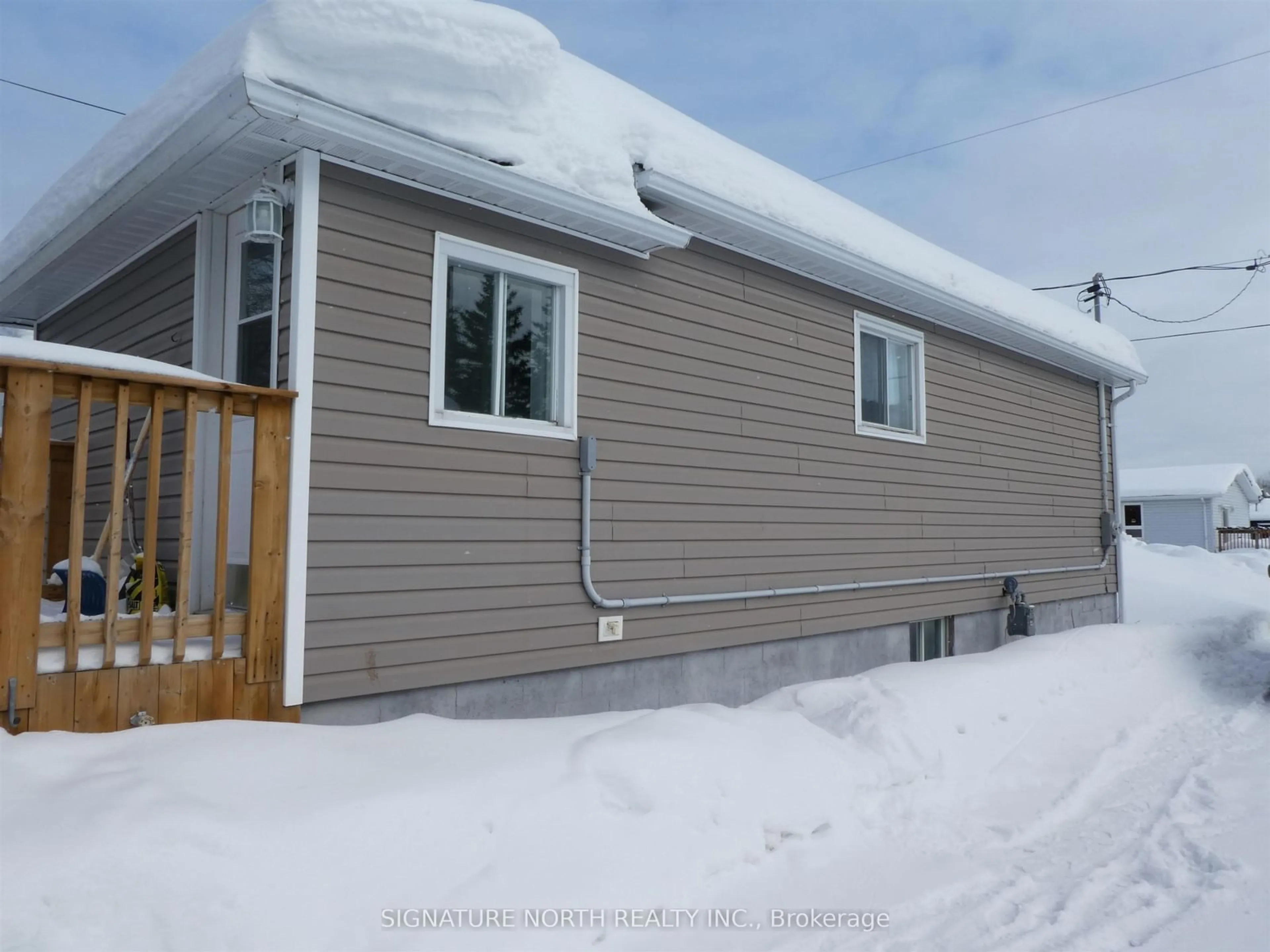 Home with vinyl exterior material, street for First St E, Greenstone Ontario P0T 1M0