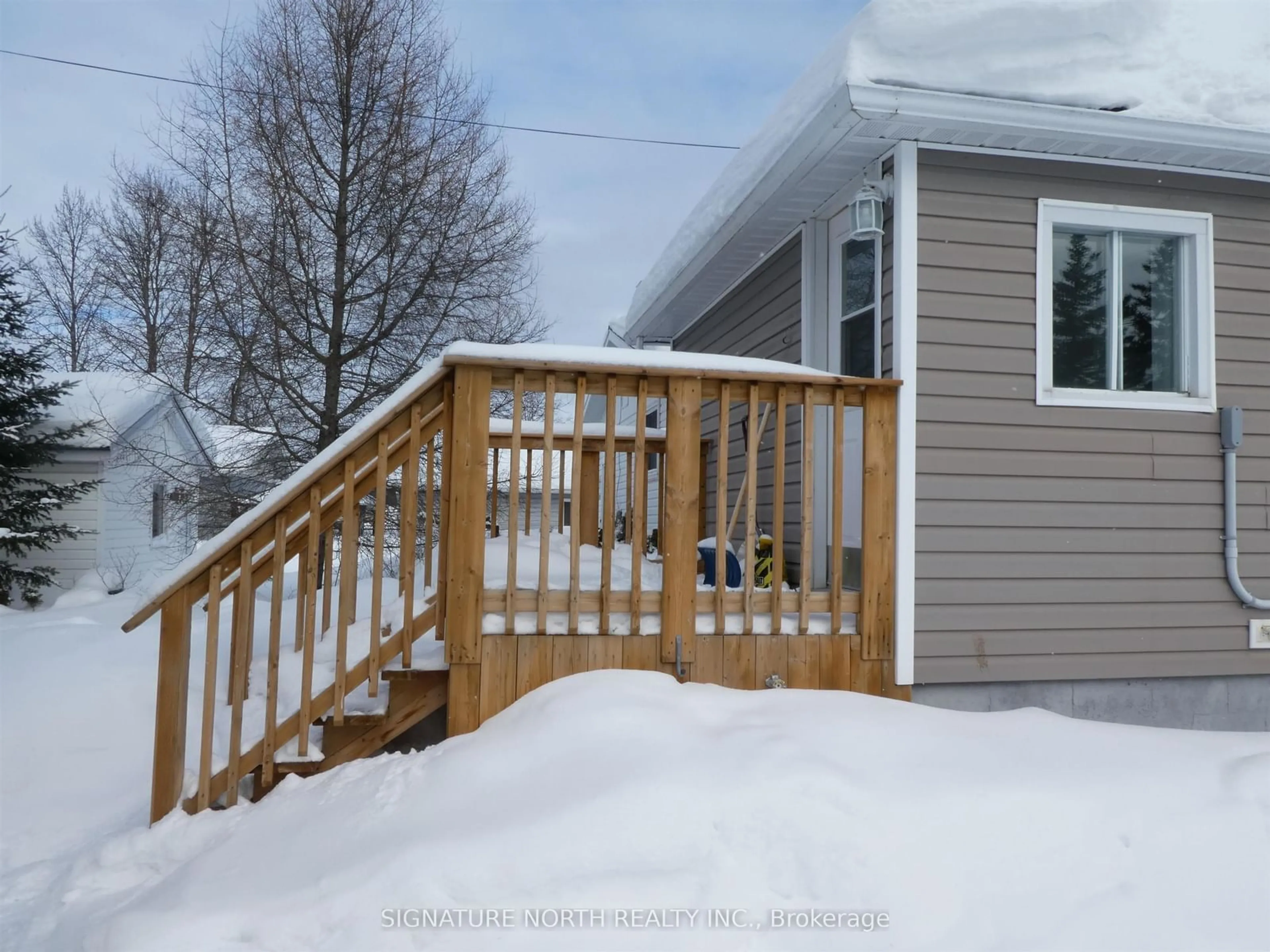 Home with vinyl exterior material, street for First St E, Greenstone Ontario P0T 1M0