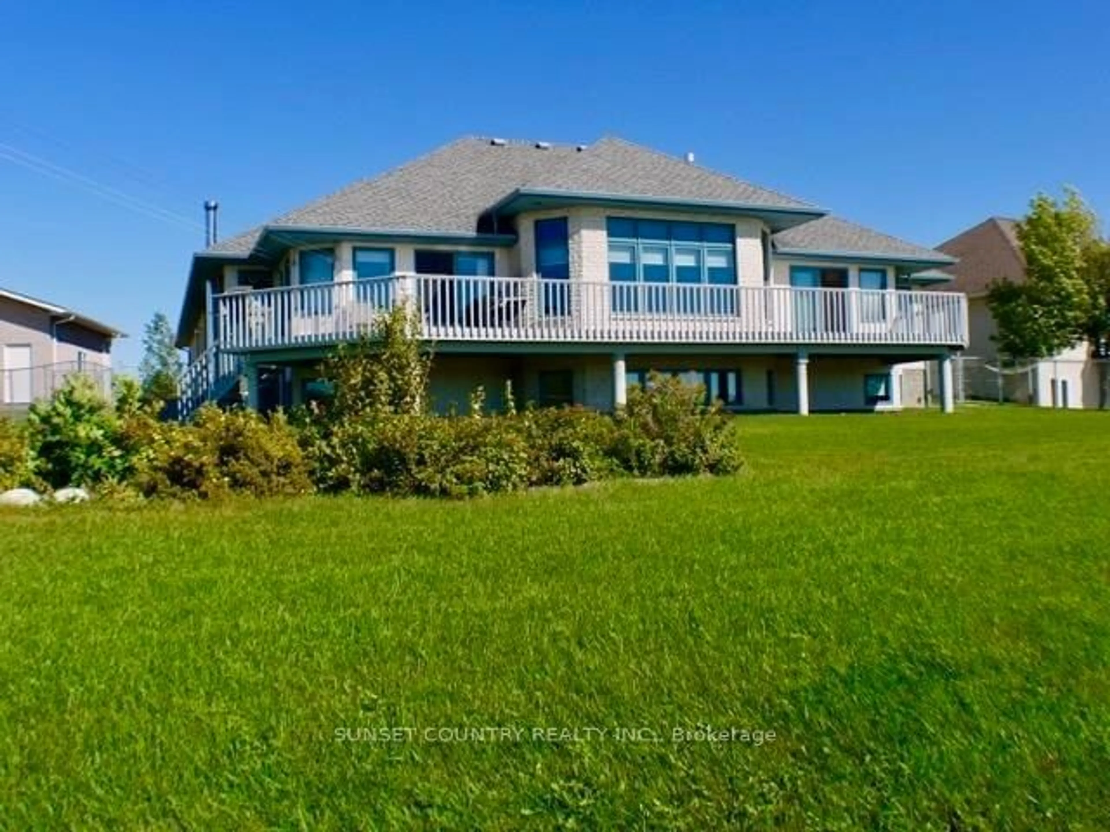 A pic from outside/outdoor area/front of a property/back of a property/a pic from drone, water/lake/river/ocean view for 92 Edgewater Dr, Dryden Ontario P8N 3K2