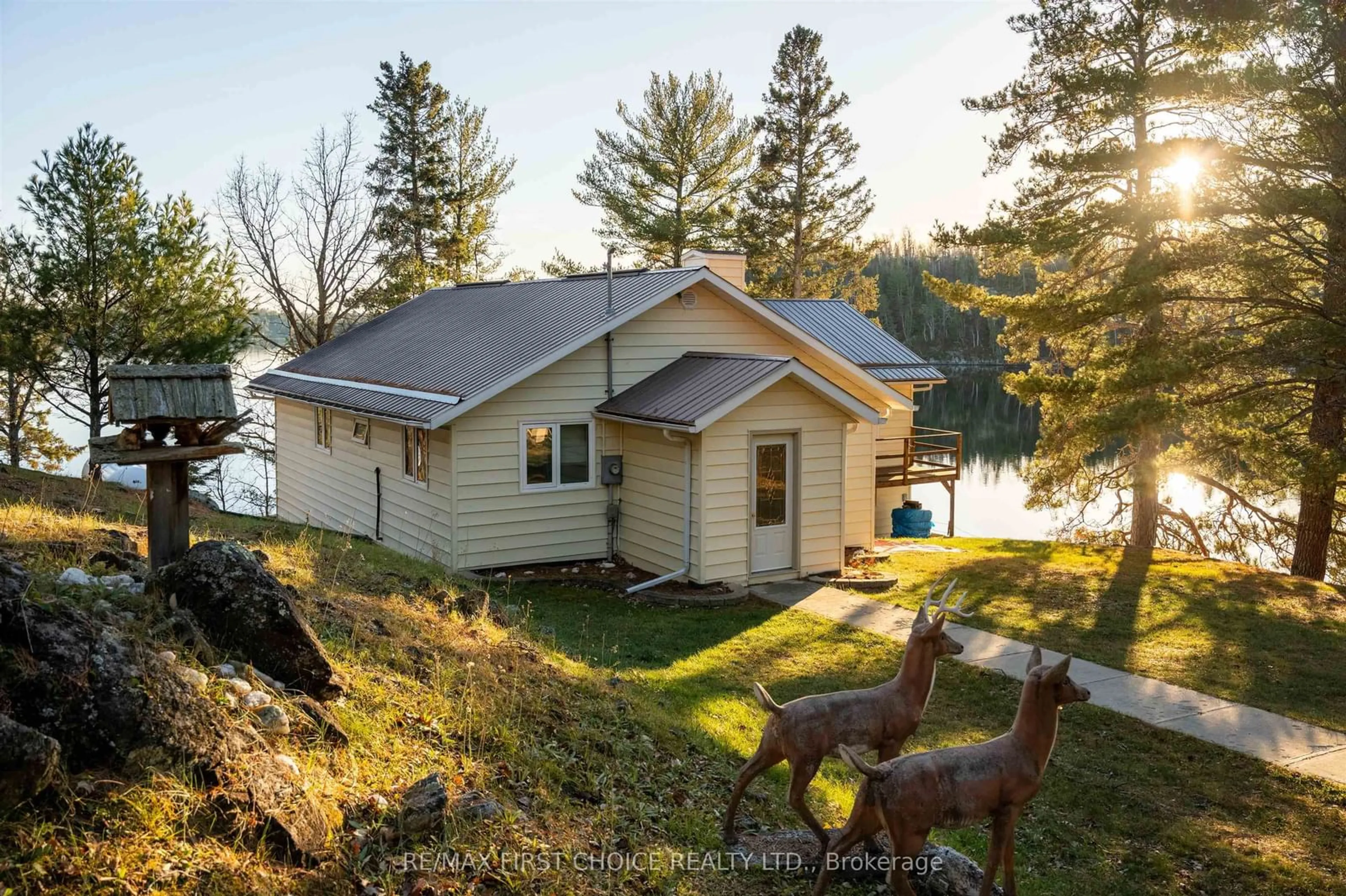 A pic from outside/outdoor area/front of a property/back of a property/a pic from drone, water/lake/river/ocean view for 21 Tinker's Rd, Sioux Narrows-Nestor Falls Ontario P0X 1K0