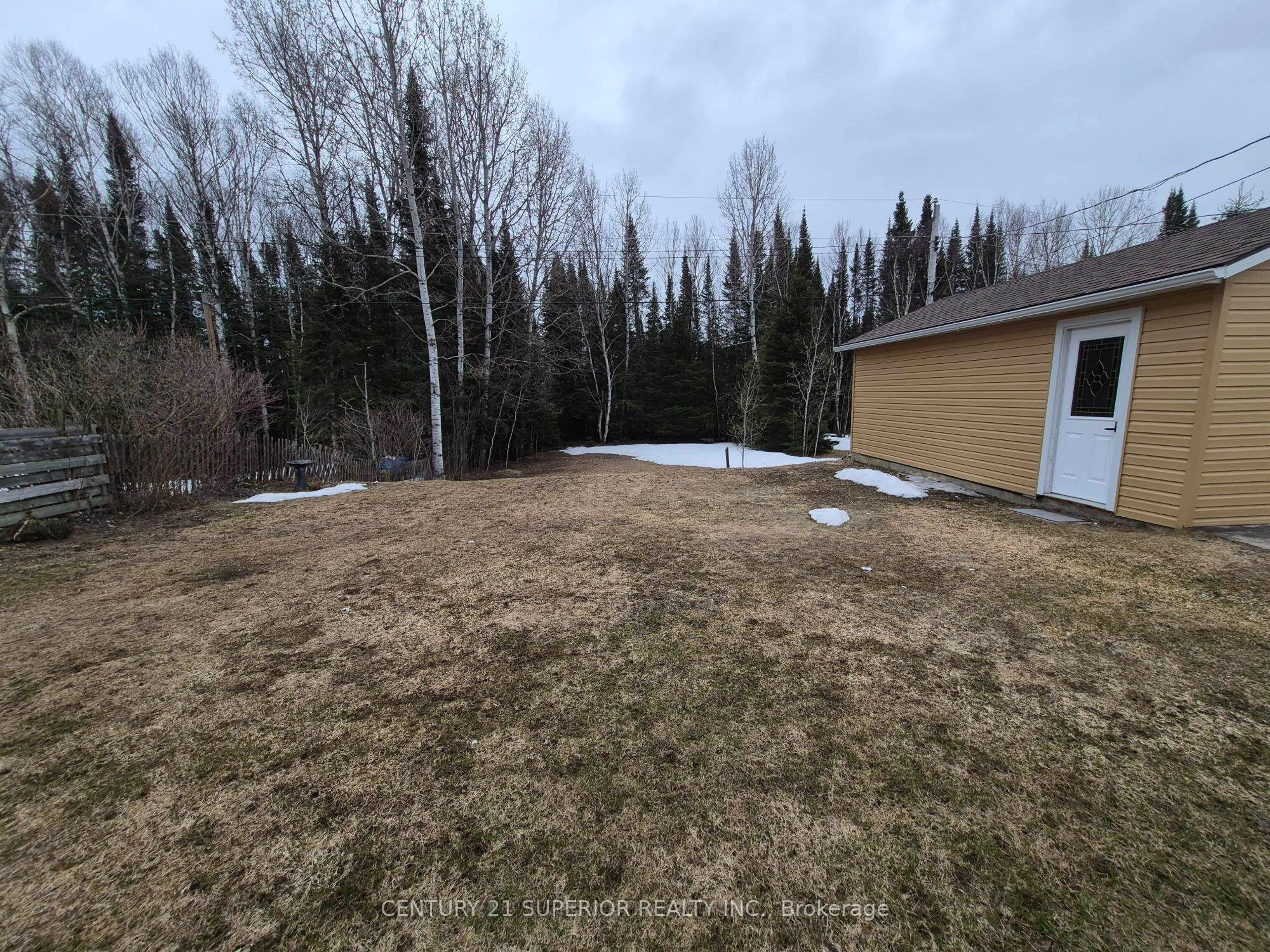 A pic from outside/outdoor area/front of a property/back of a property/a pic from drone, forest/trees view for 34 Redwing Ave, Manitouwadge Ontario P0T 2C0