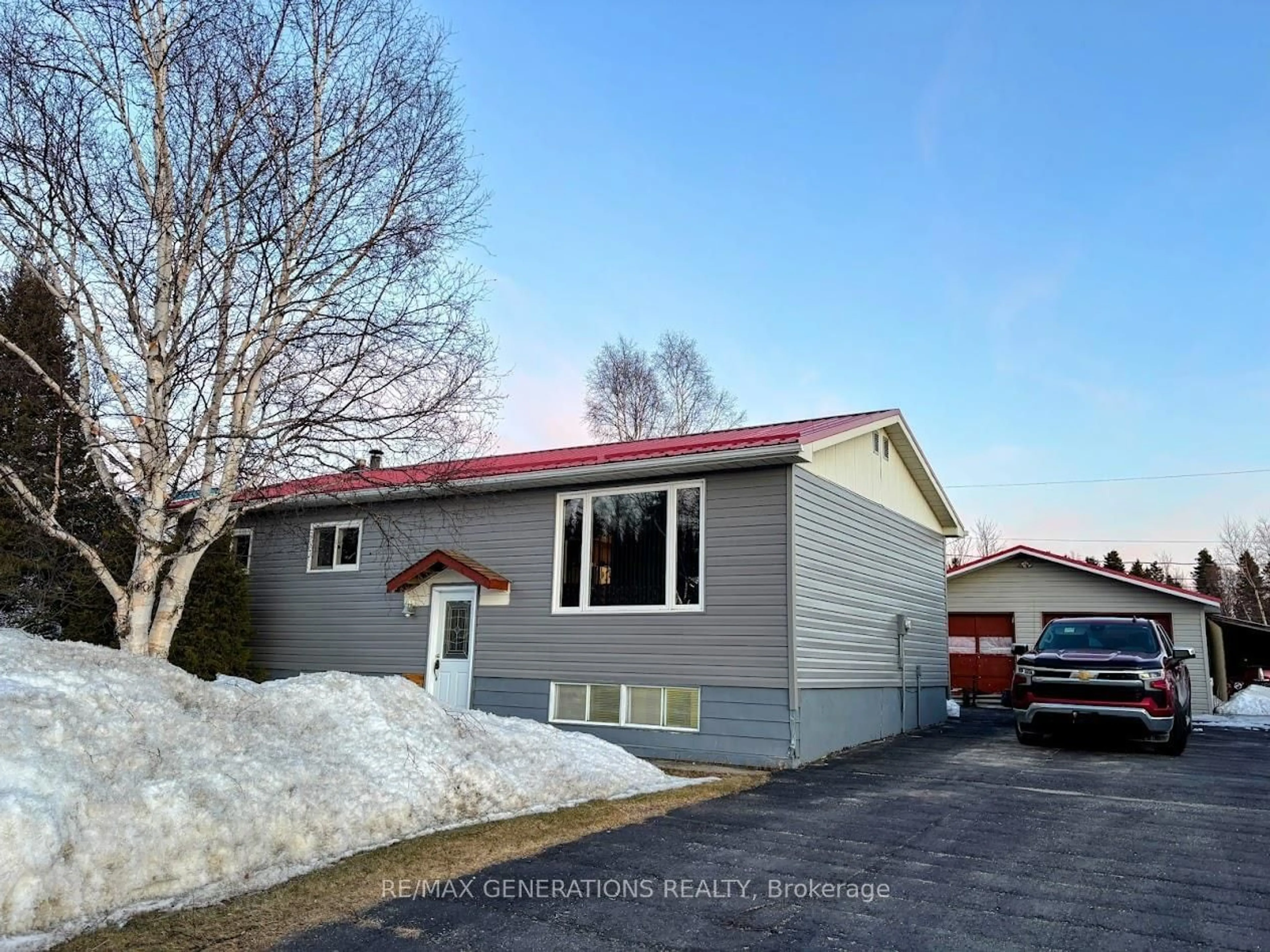 Home with vinyl exterior material, street for 14 Lloyd Irwin St, Marathon Ontario P0T 2E0