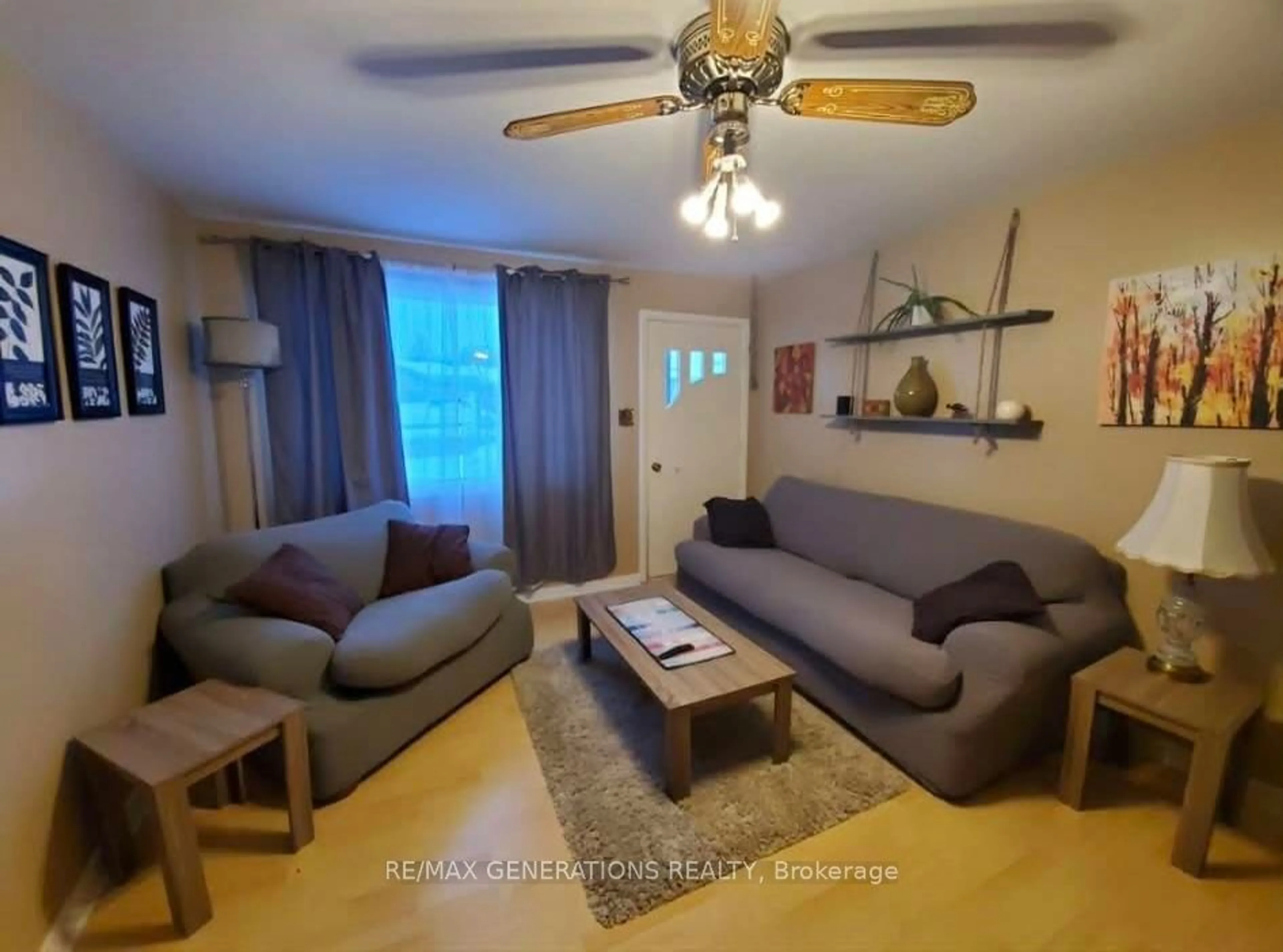 Living room with furniture, wood/laminate floor for 71 Manitou Rd, Manitouwadge Ontario P0T 2C0
