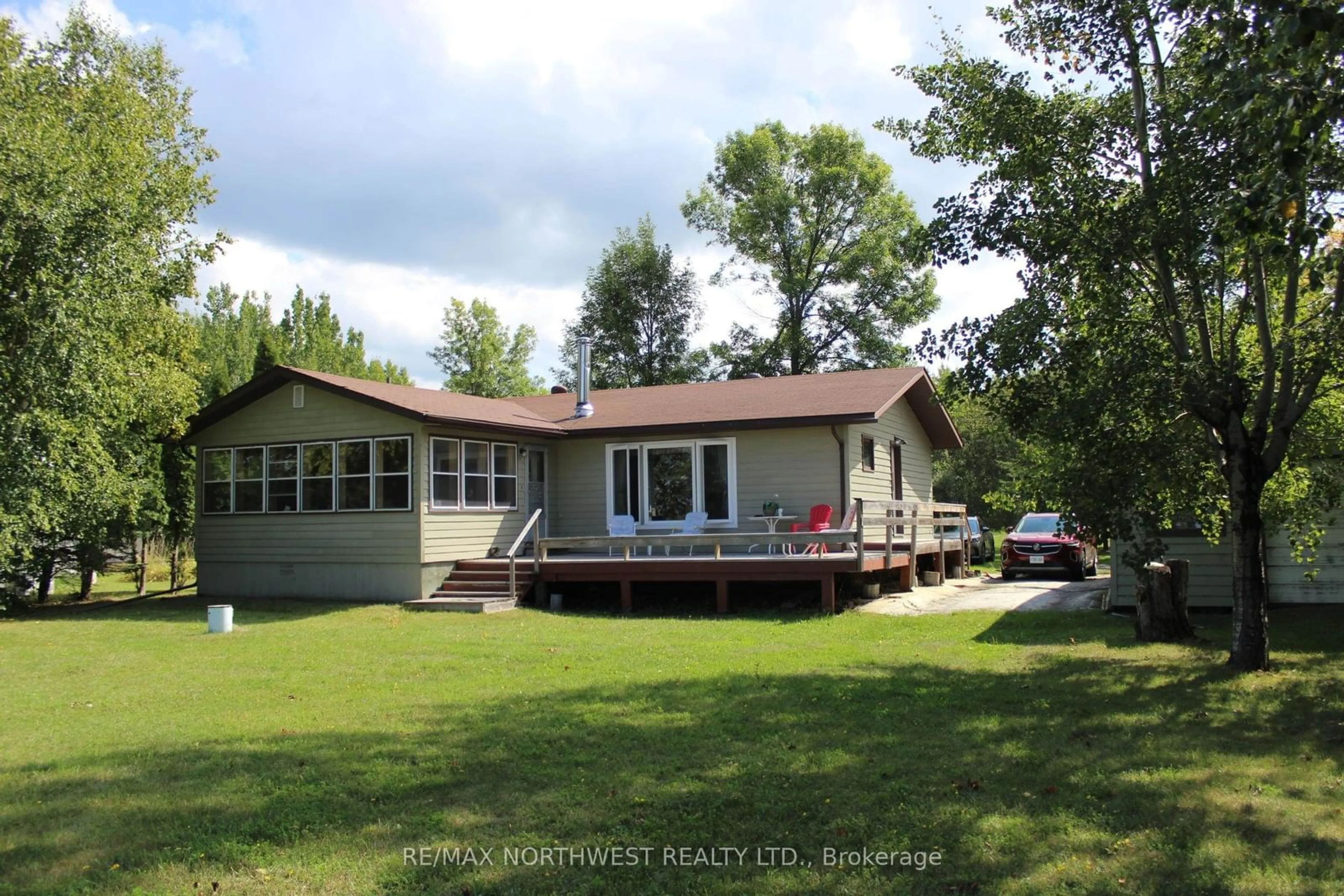 A pic from outside/outdoor area/front of a property/back of a property/a pic from drone, water/lake/river/ocean view for 93 STINTZI DR E, Lake of the Woods Ontario P0W 1J0