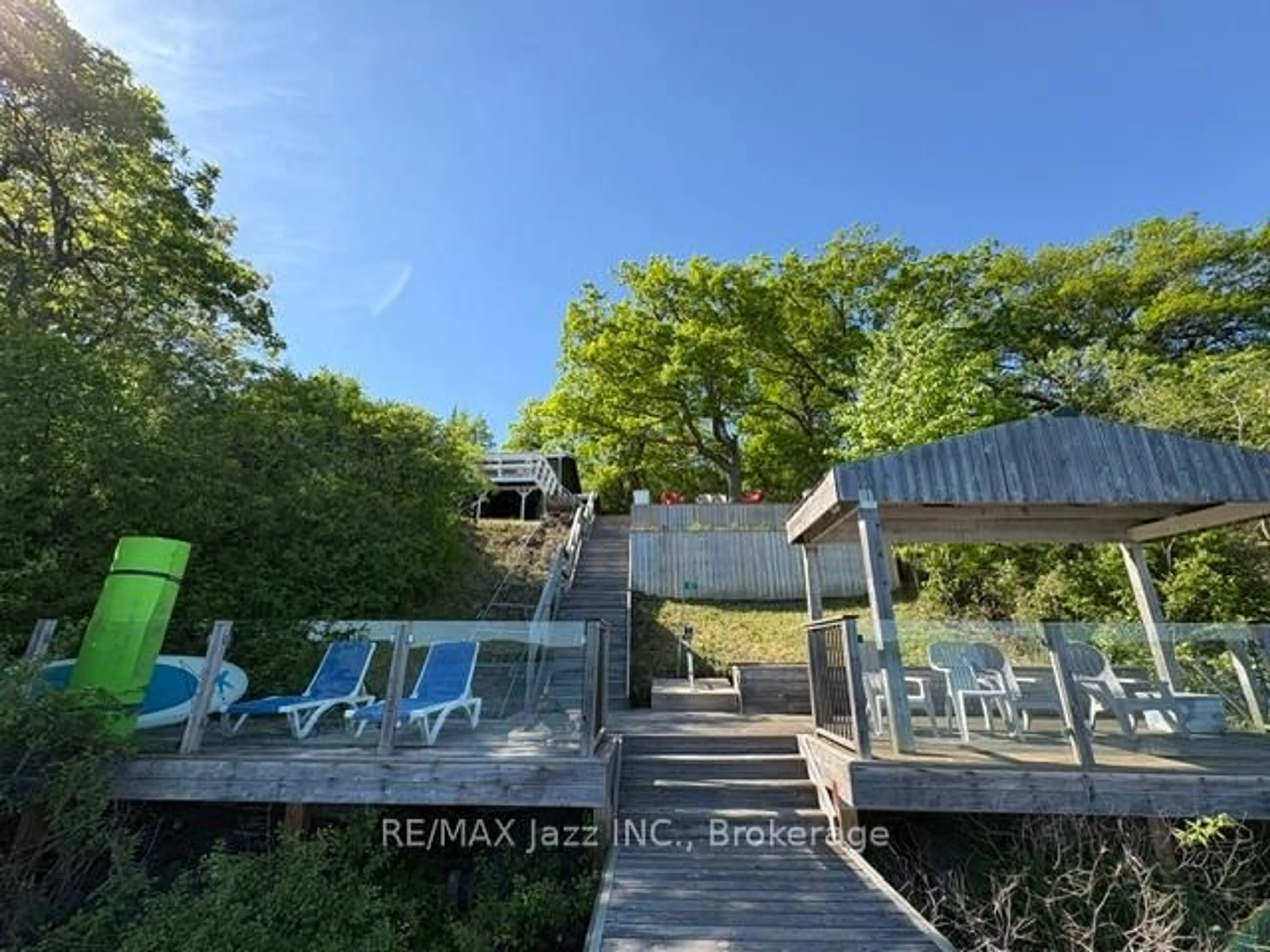 A pic from outside/outdoor area/front of a property/back of a property/a pic from drone, forest/trees view for 82 Cow Island, Otonabee-South Monaghan Ontario K9J 6X8