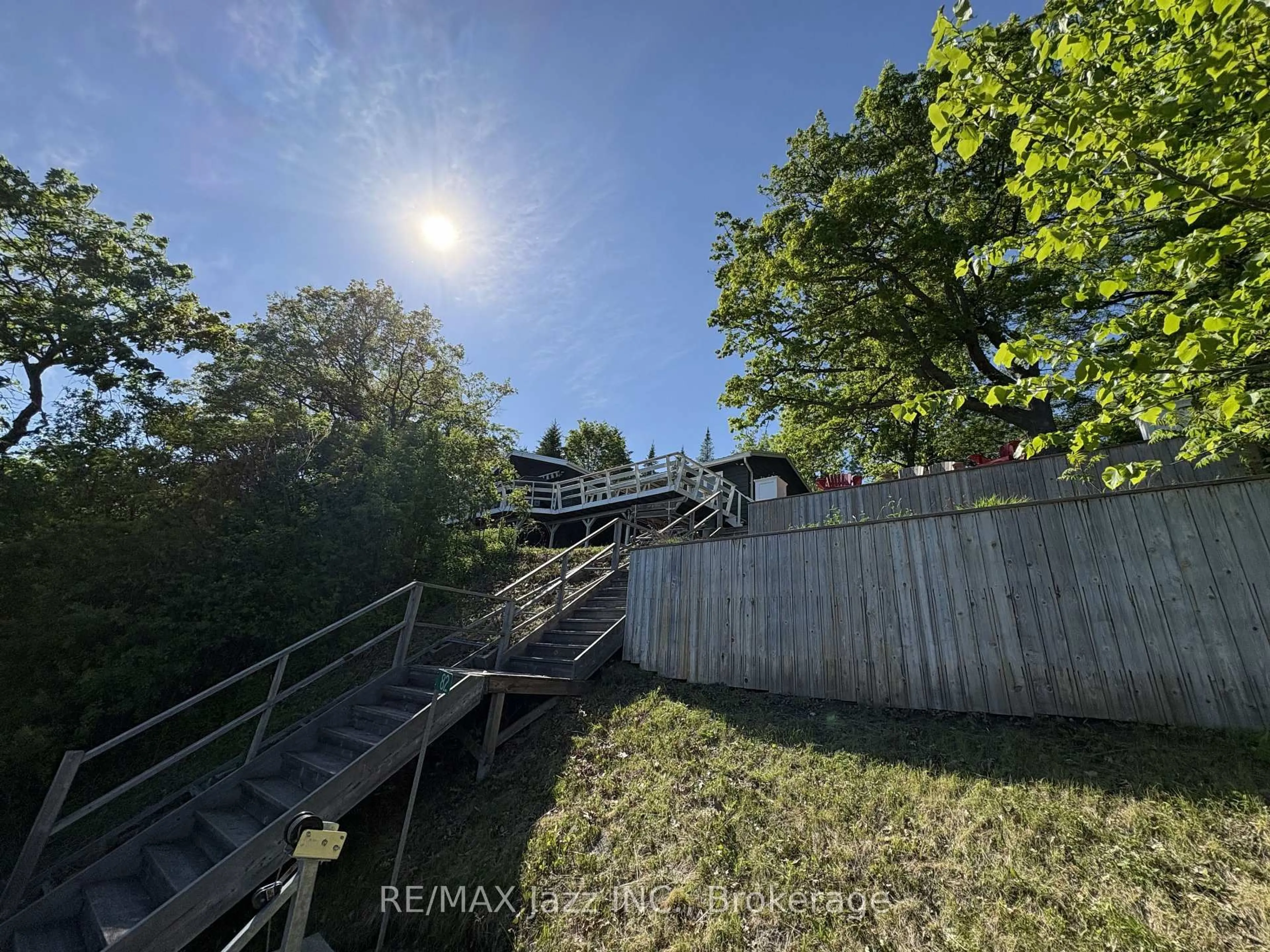 A pic from outside/outdoor area/front of a property/back of a property/a pic from drone, unknown for 82 Cow Island, Otonabee-South Monaghan Ontario K9J 6X8