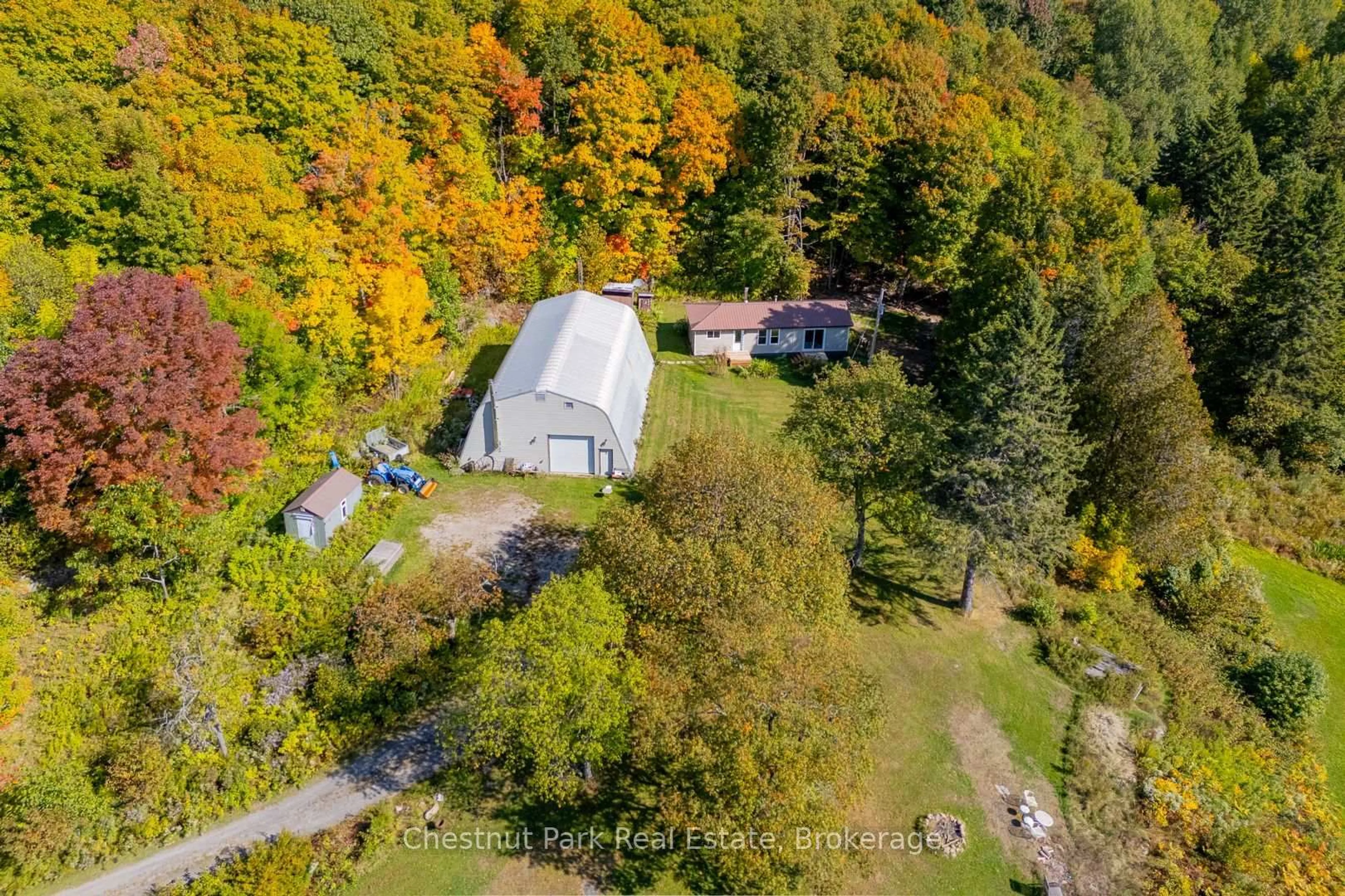 A pic from outside/outdoor area/front of a property/back of a property/a pic from drone, forest/trees view for 1190 Hekkla Rd, Muskoka Lakes Ontario P0C 1J0