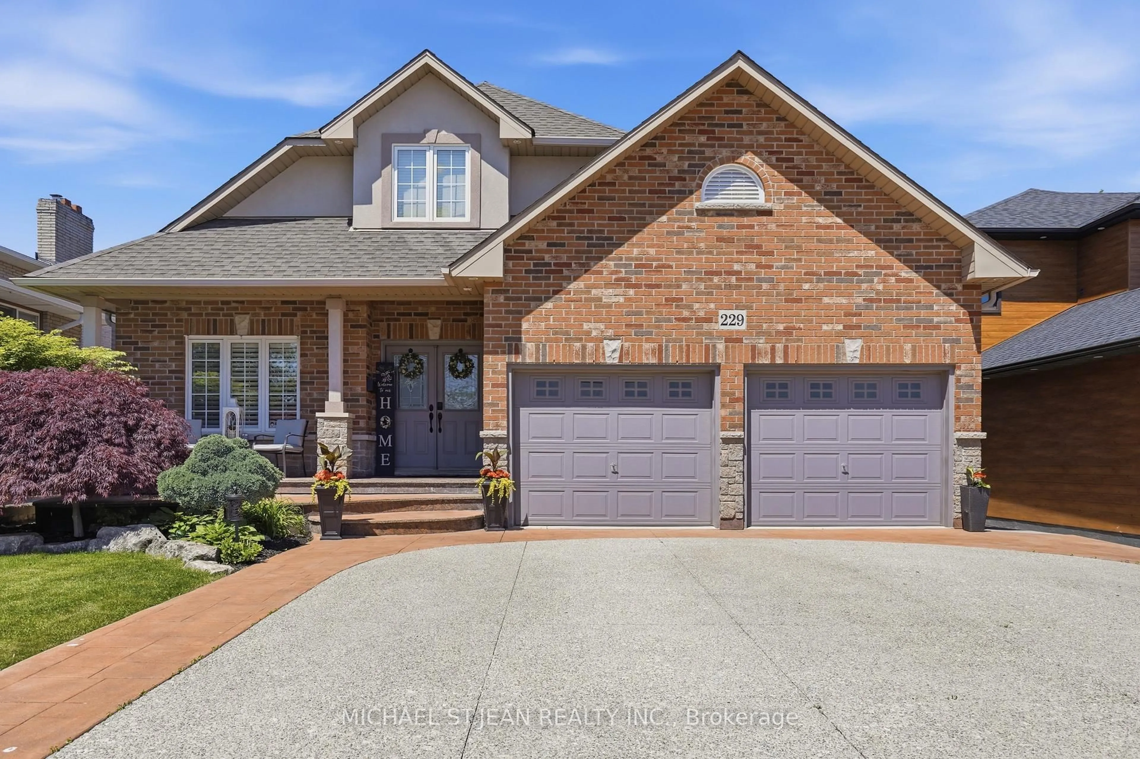 Home with brick exterior material, street for 229 Millen Rd, Hamilton Ontario L8E 2G8