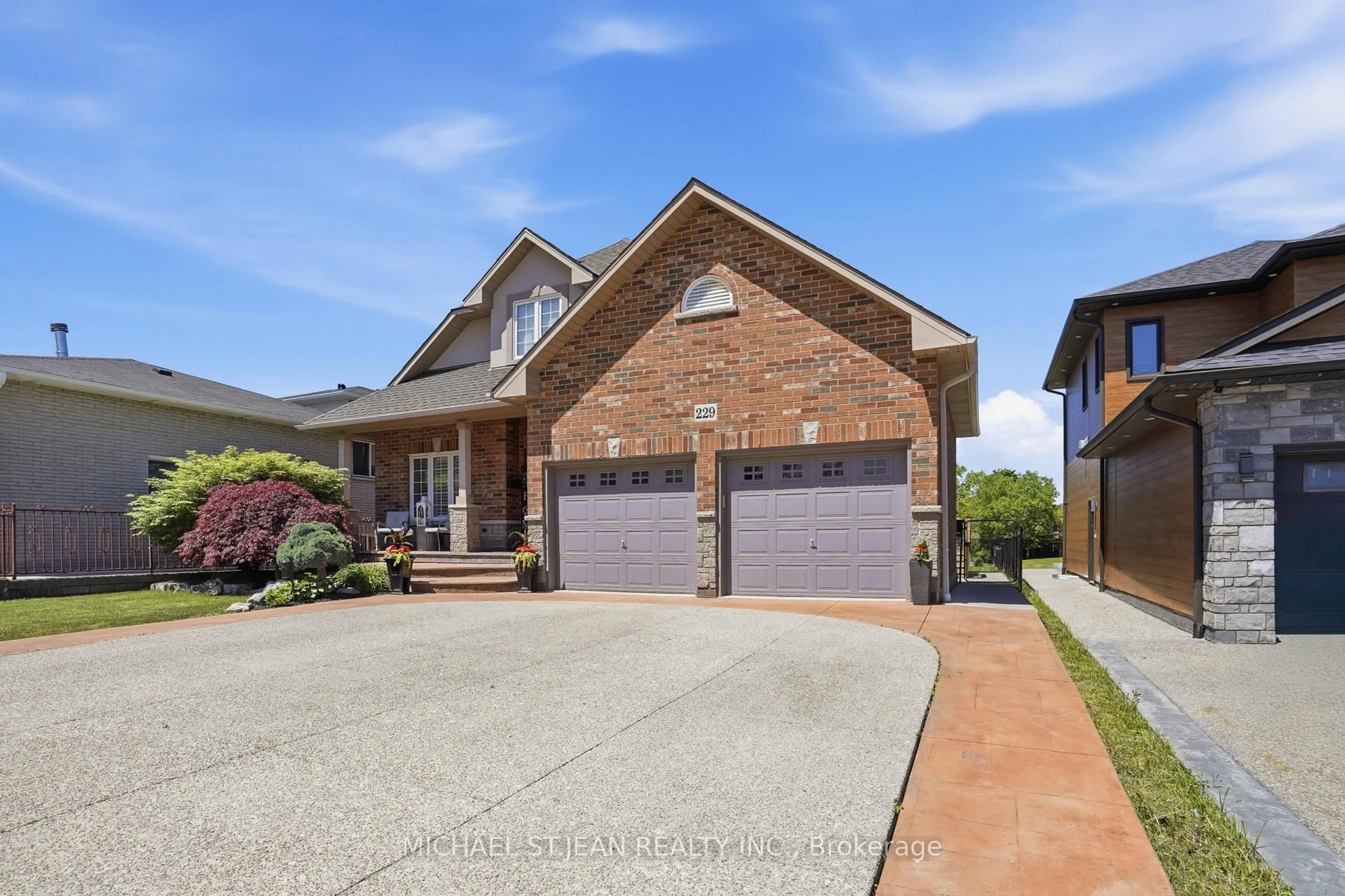 Home with brick exterior material, street for 229 Millen Rd, Hamilton Ontario L8E 2G8