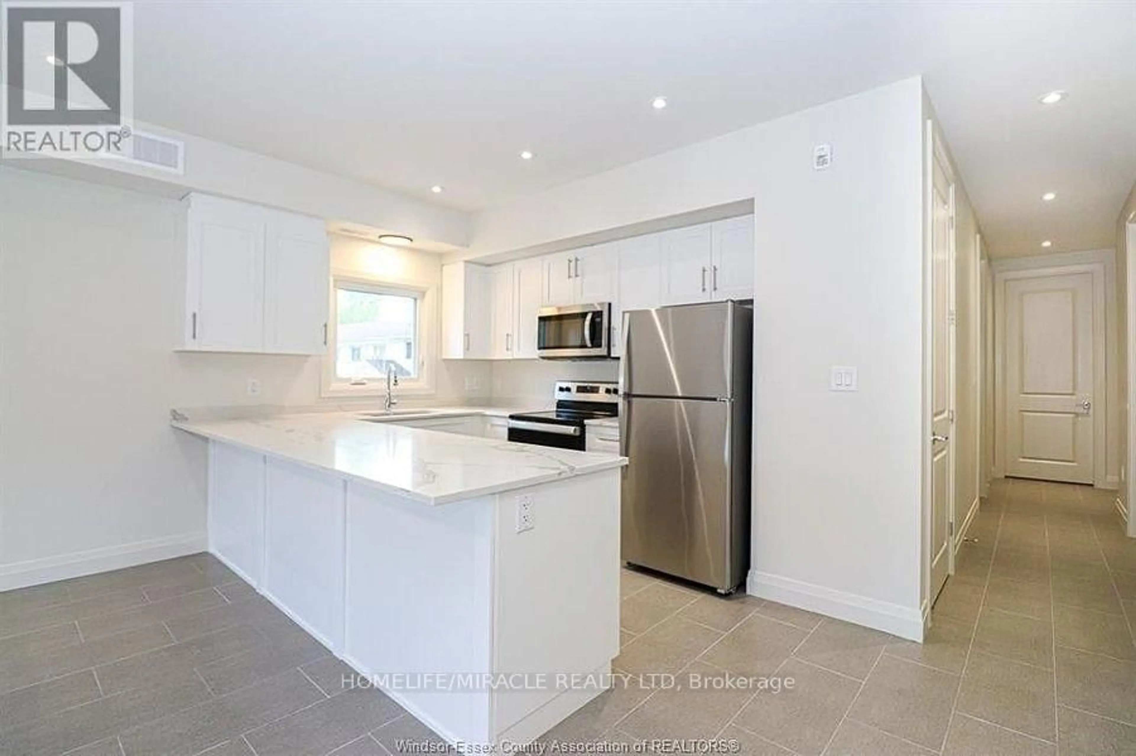Open concept kitchen, unknown for 233 Watson Ave #204, Windsor Ontario N8S 3R8