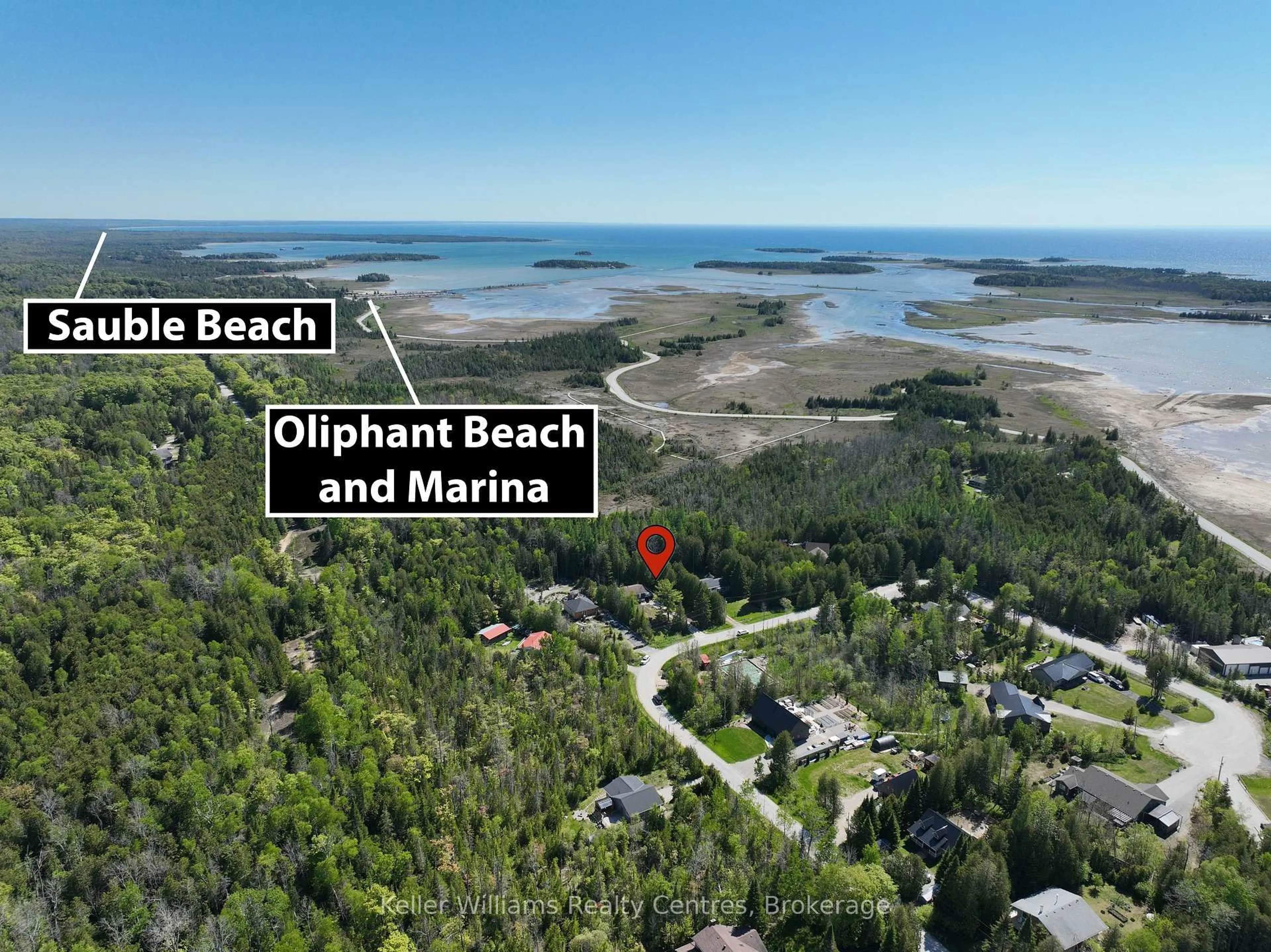 A pic from outside/outdoor area/front of a property/back of a property/a pic from drone, water/lake/river/ocean view for 67 William Crt, South Bruce Peninsula Ontario N0H 2T0