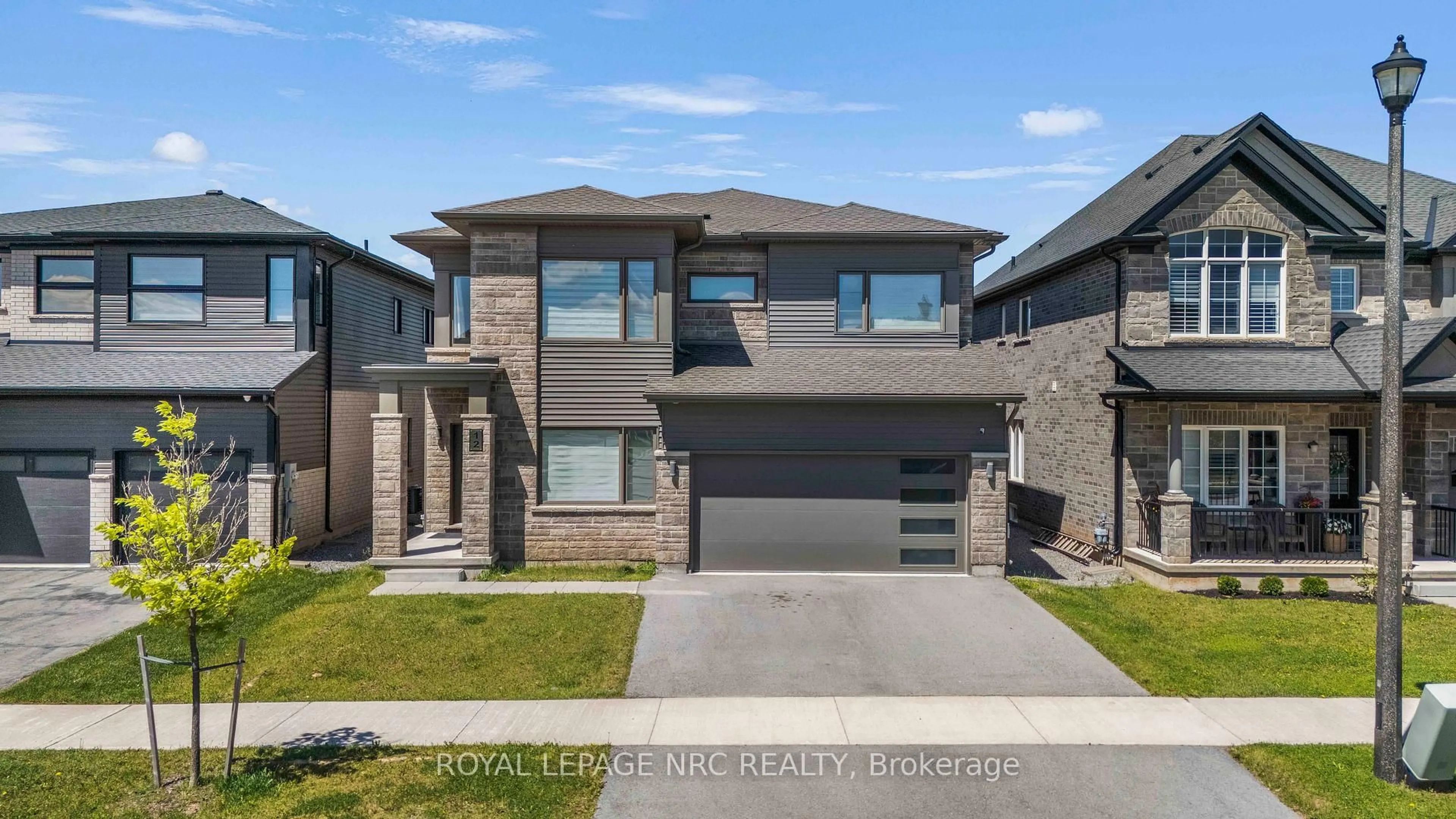 Home with brick exterior material, street for 12 Swan Ave, Pelham Ontario L0S 1E6