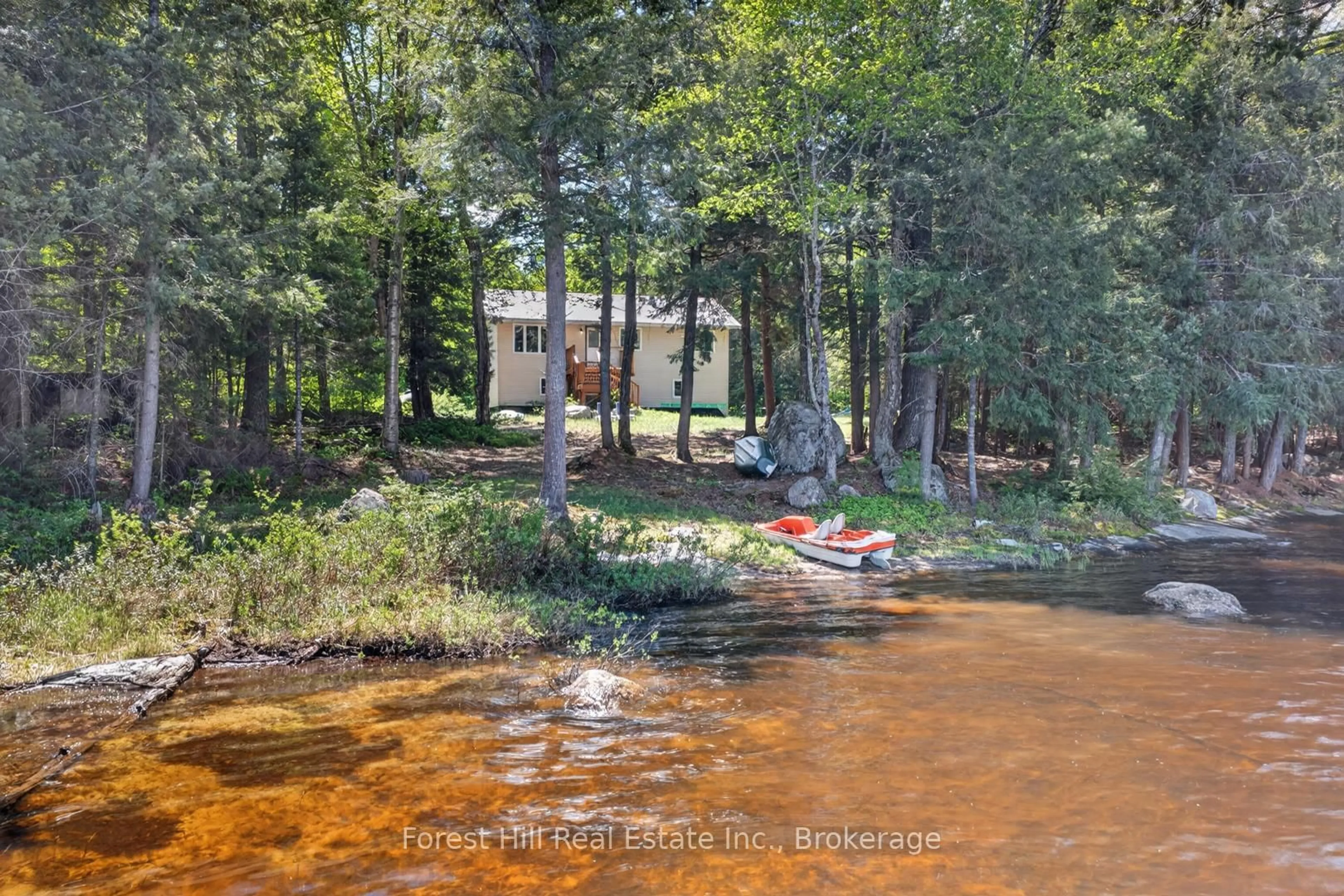 A pic from outside/outdoor area/front of a property/back of a property/a pic from drone, water/lake/river/ocean view for 439A Baker Rd, Magnetawan Ontario P0A 1C0