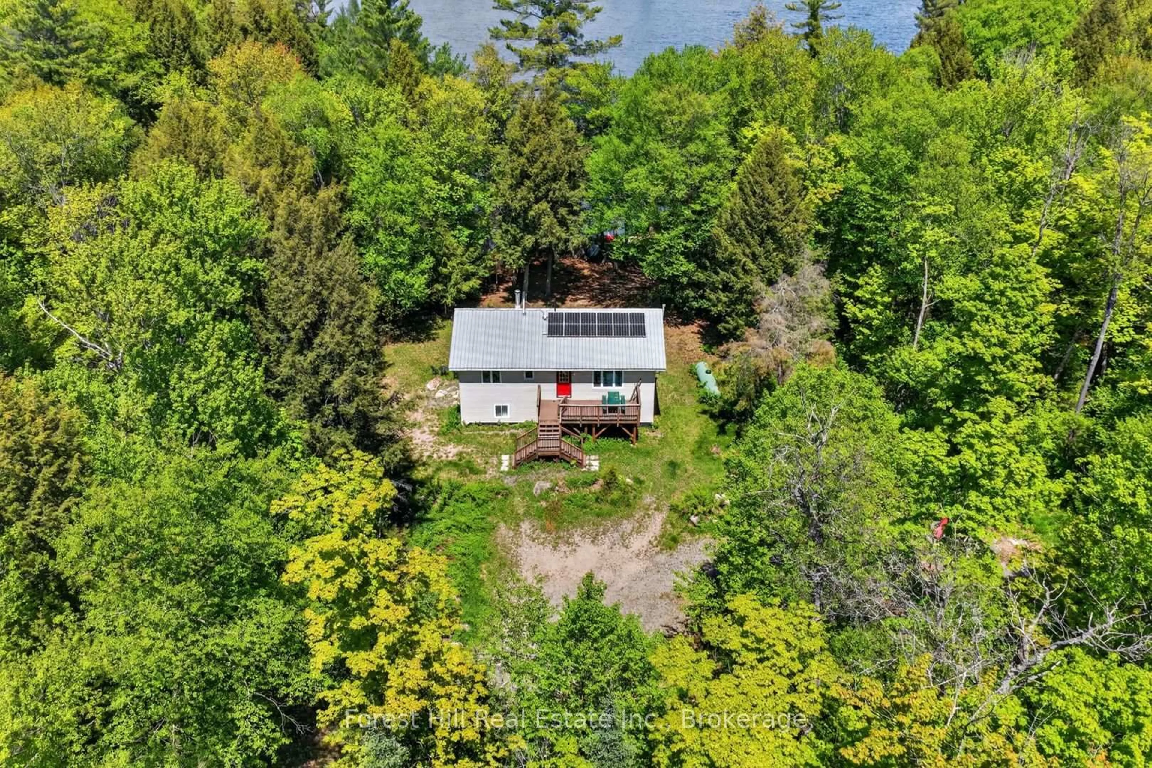 A pic from outside/outdoor area/front of a property/back of a property/a pic from drone, unknown for 439A Baker Rd, Magnetawan Ontario P0A 1C0