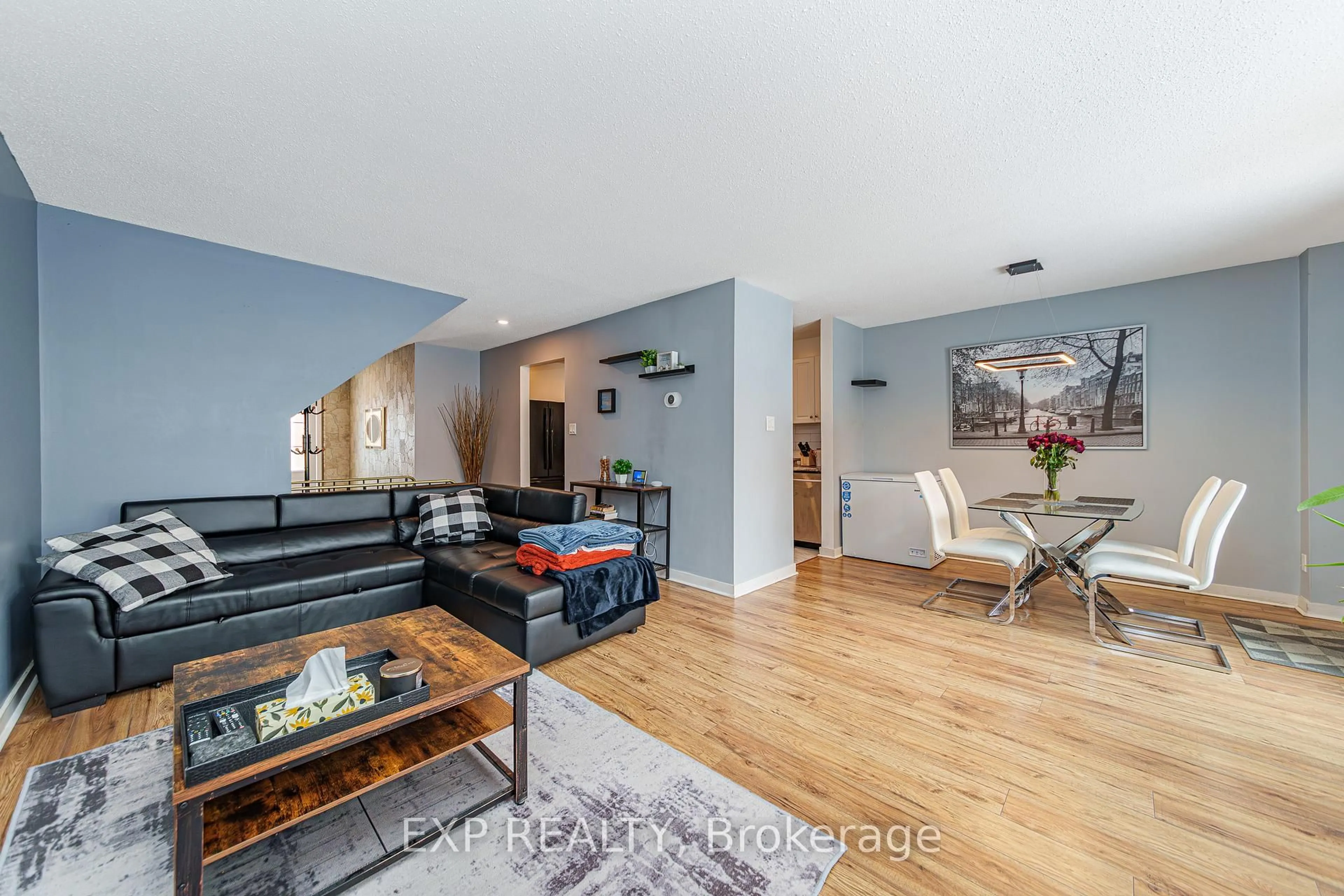 Living room with furniture, wood/laminate floor for 224 Romulus Private #81, Ottawa Ontario K1K 3Y2
