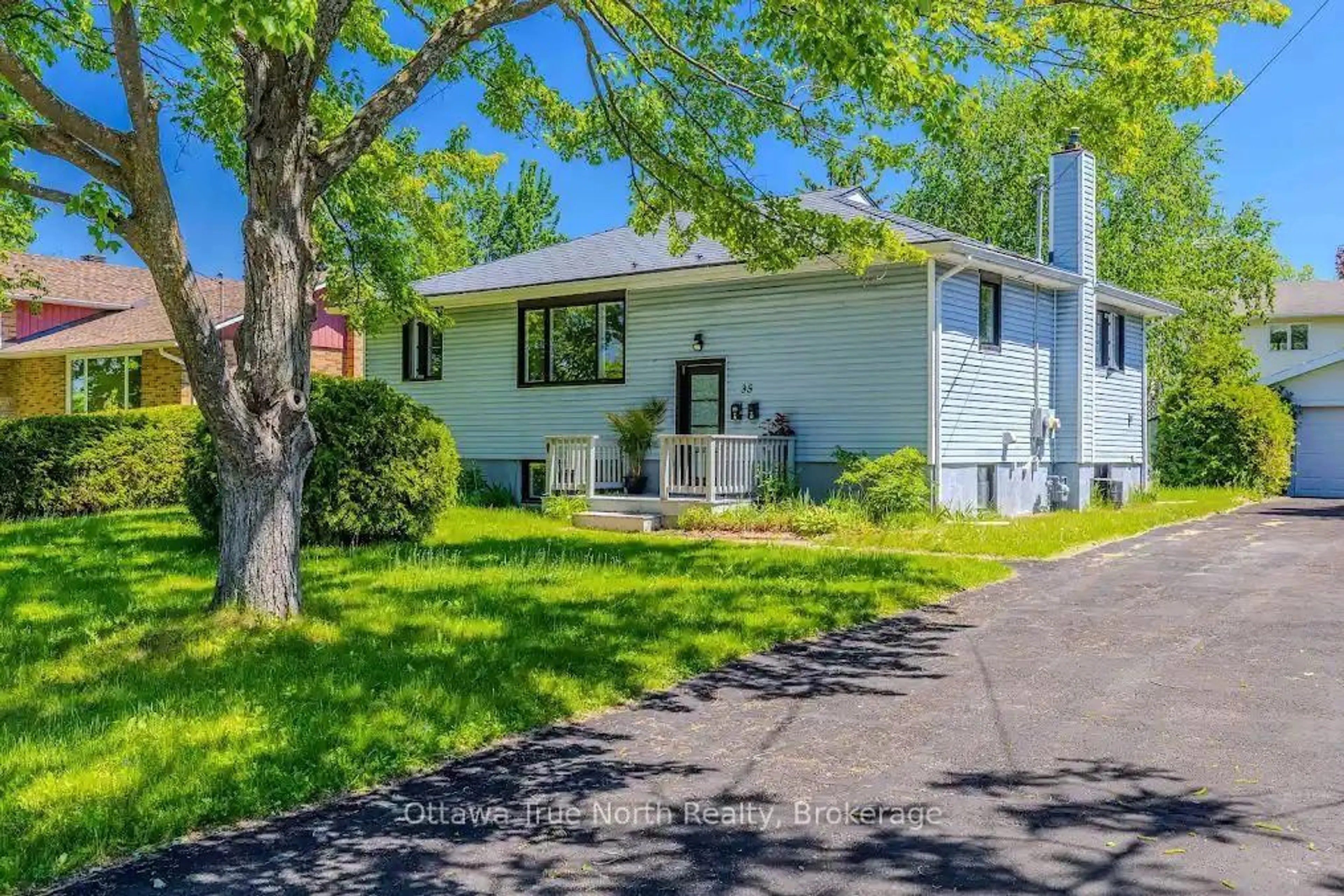 Home with vinyl exterior material, street for 35 Tauvette St, Ottawa Ontario K1B 3A1