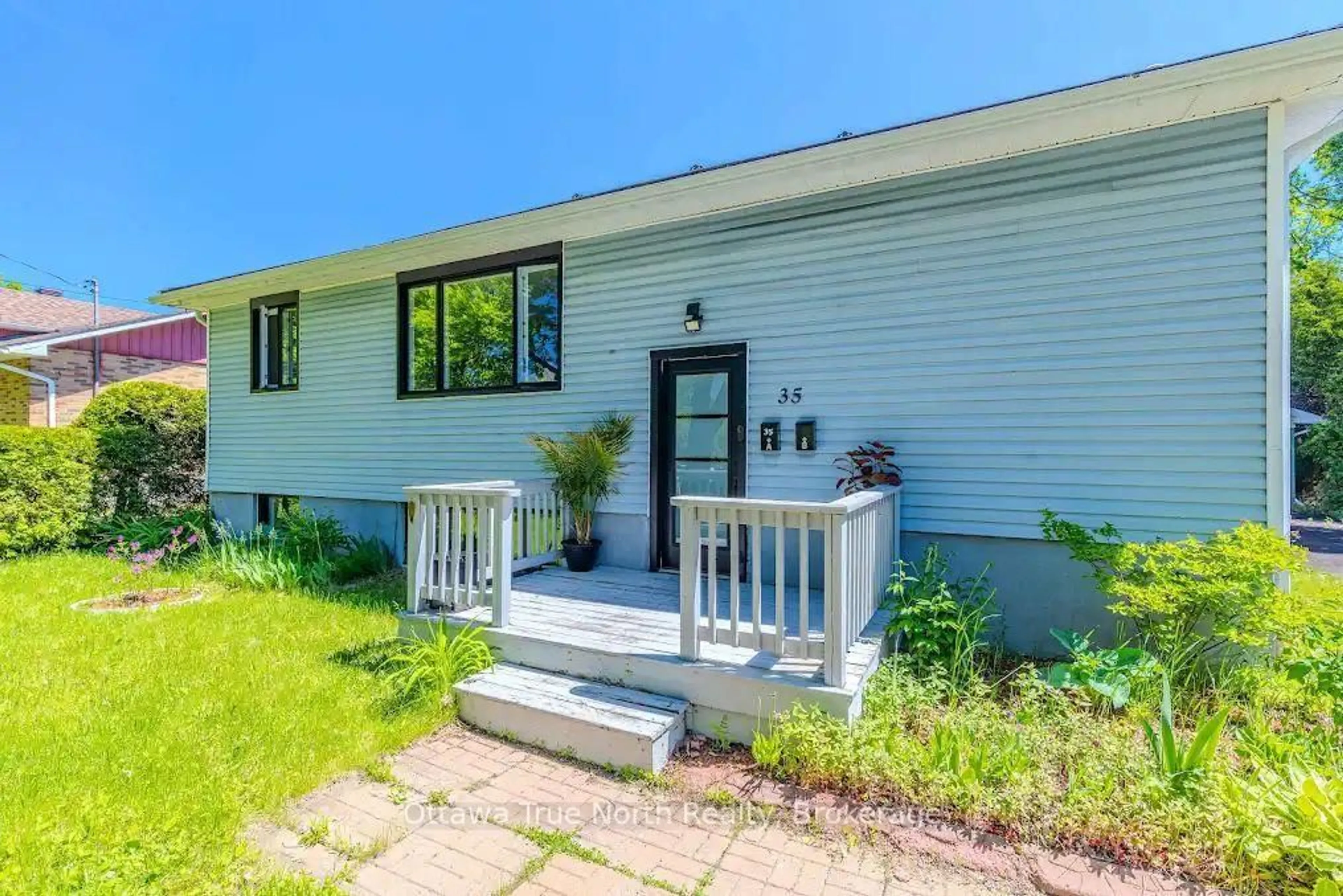 Home with vinyl exterior material, street for 35 Tauvette St, Ottawa Ontario K1B 3A1
