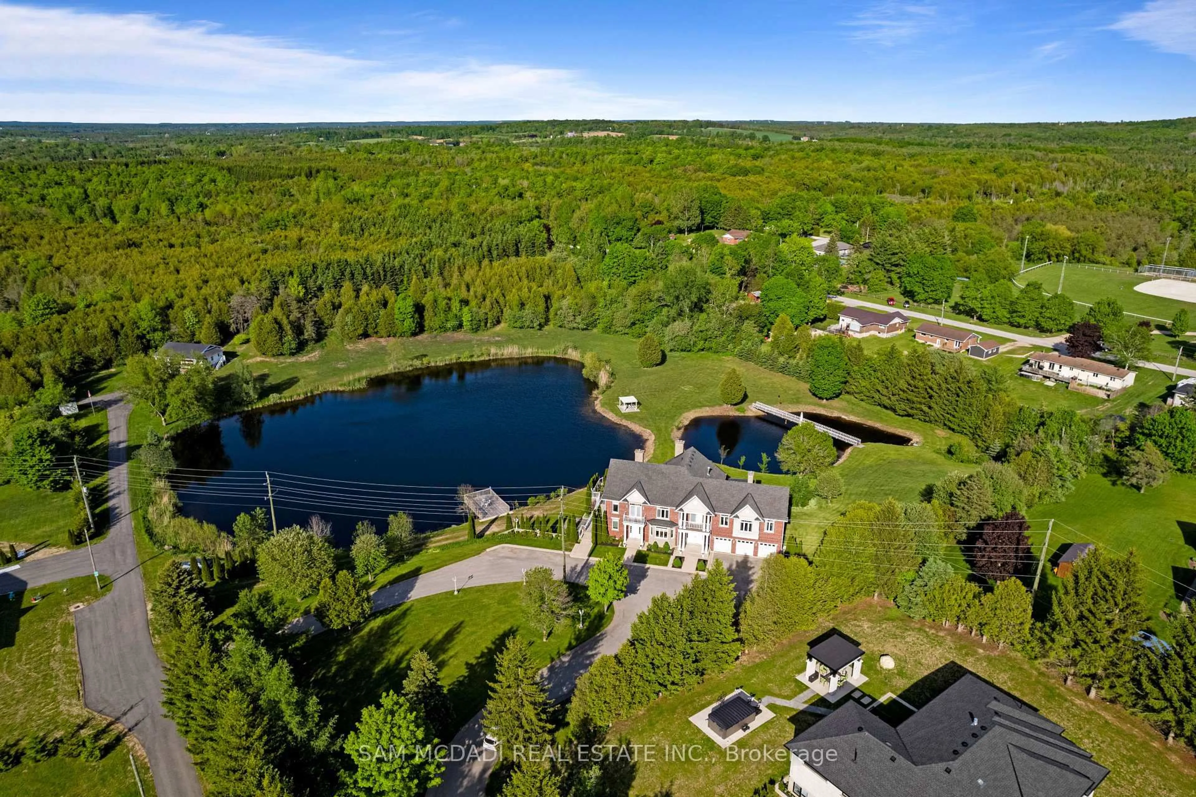A pic from outside/outdoor area/front of a property/back of a property/a pic from drone, water/lake/river/ocean view for 53 Peter St, Grey Highlands Ontario N0C 1E0