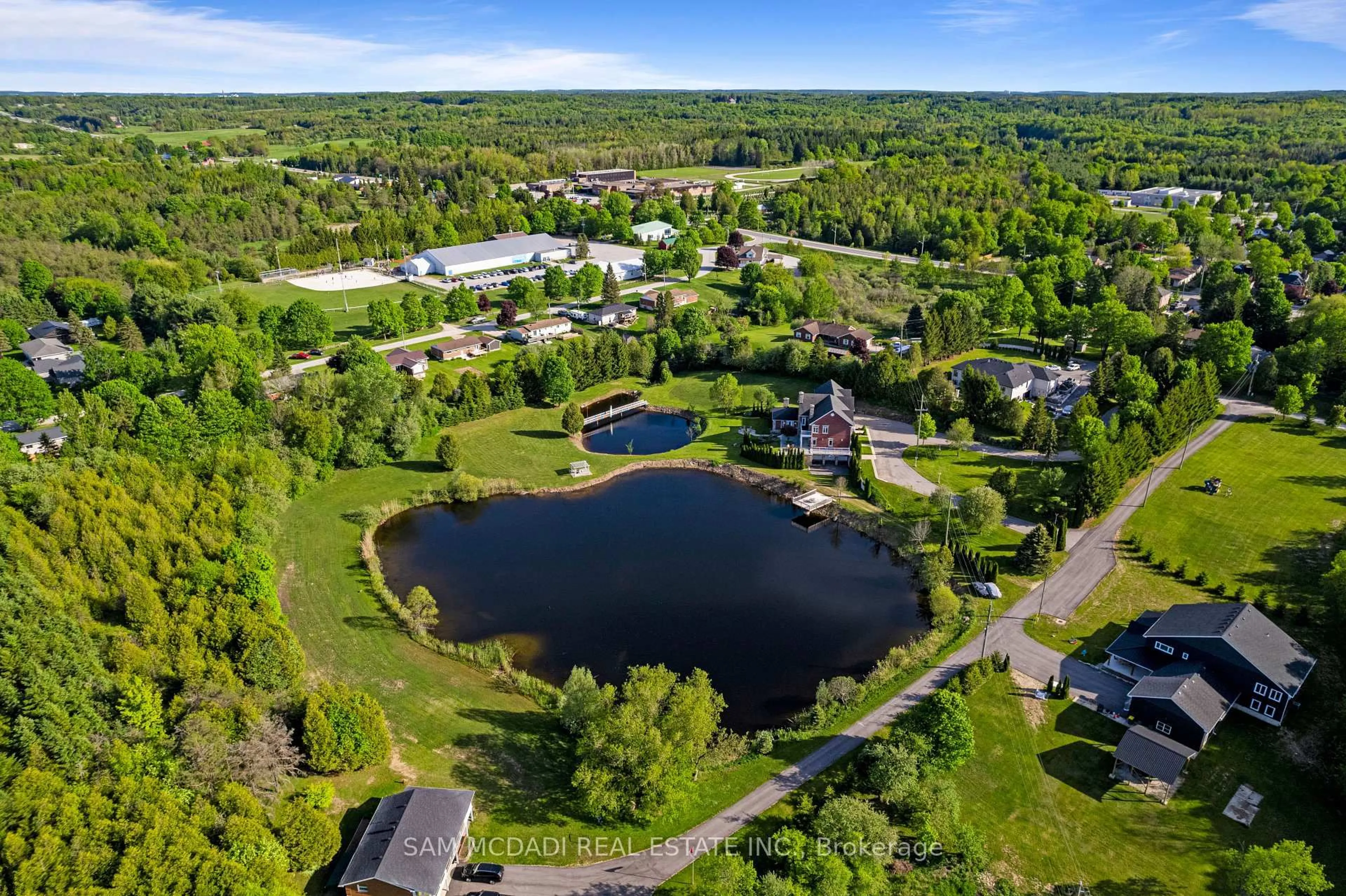 A pic from outside/outdoor area/front of a property/back of a property/a pic from drone, water/lake/river/ocean view for 53 Peter St, Grey Highlands Ontario N0C 1E0