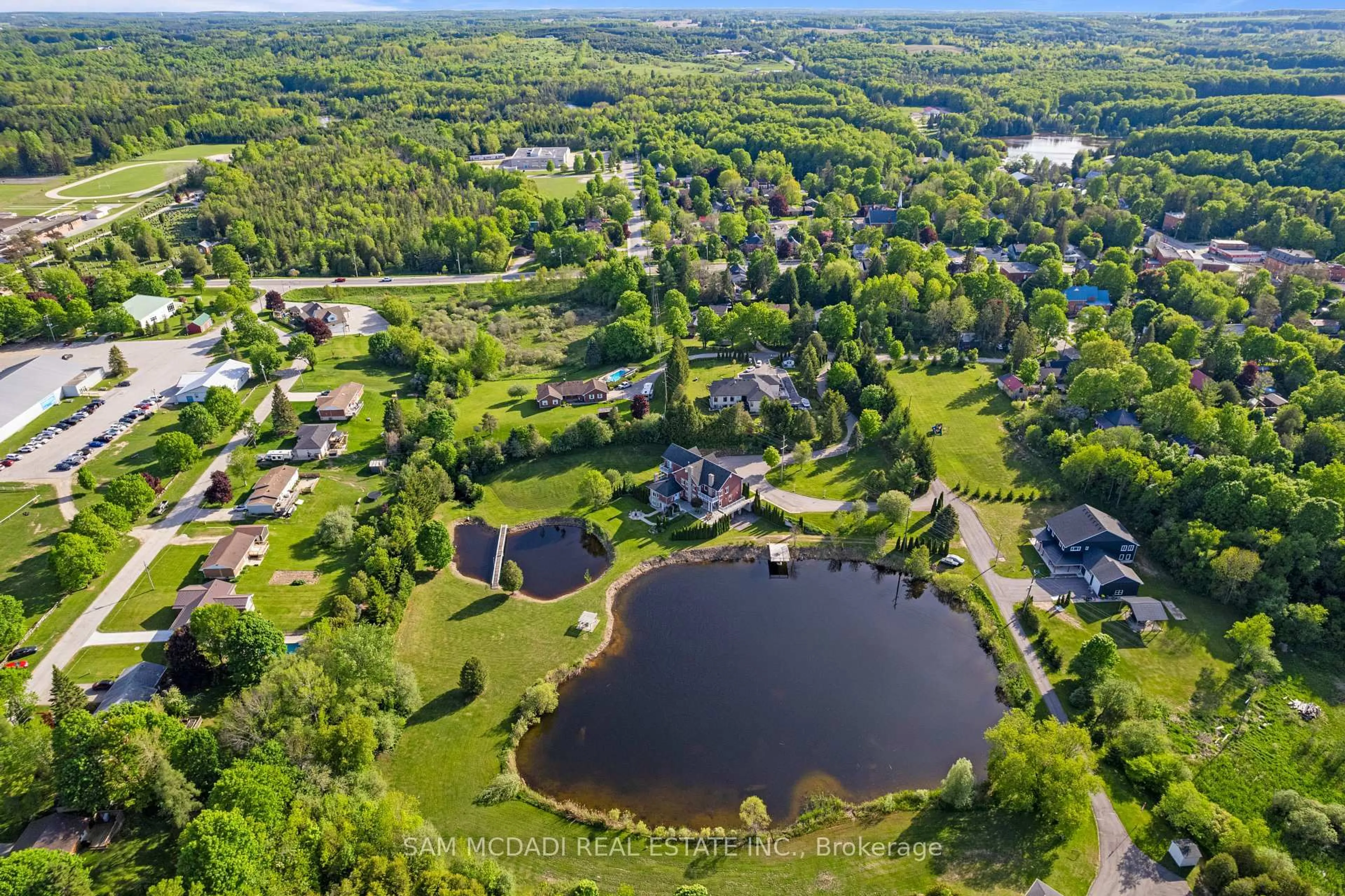 A pic from outside/outdoor area/front of a property/back of a property/a pic from drone, water/lake/river/ocean view for 53 Peter St, Grey Highlands Ontario N0C 1E0