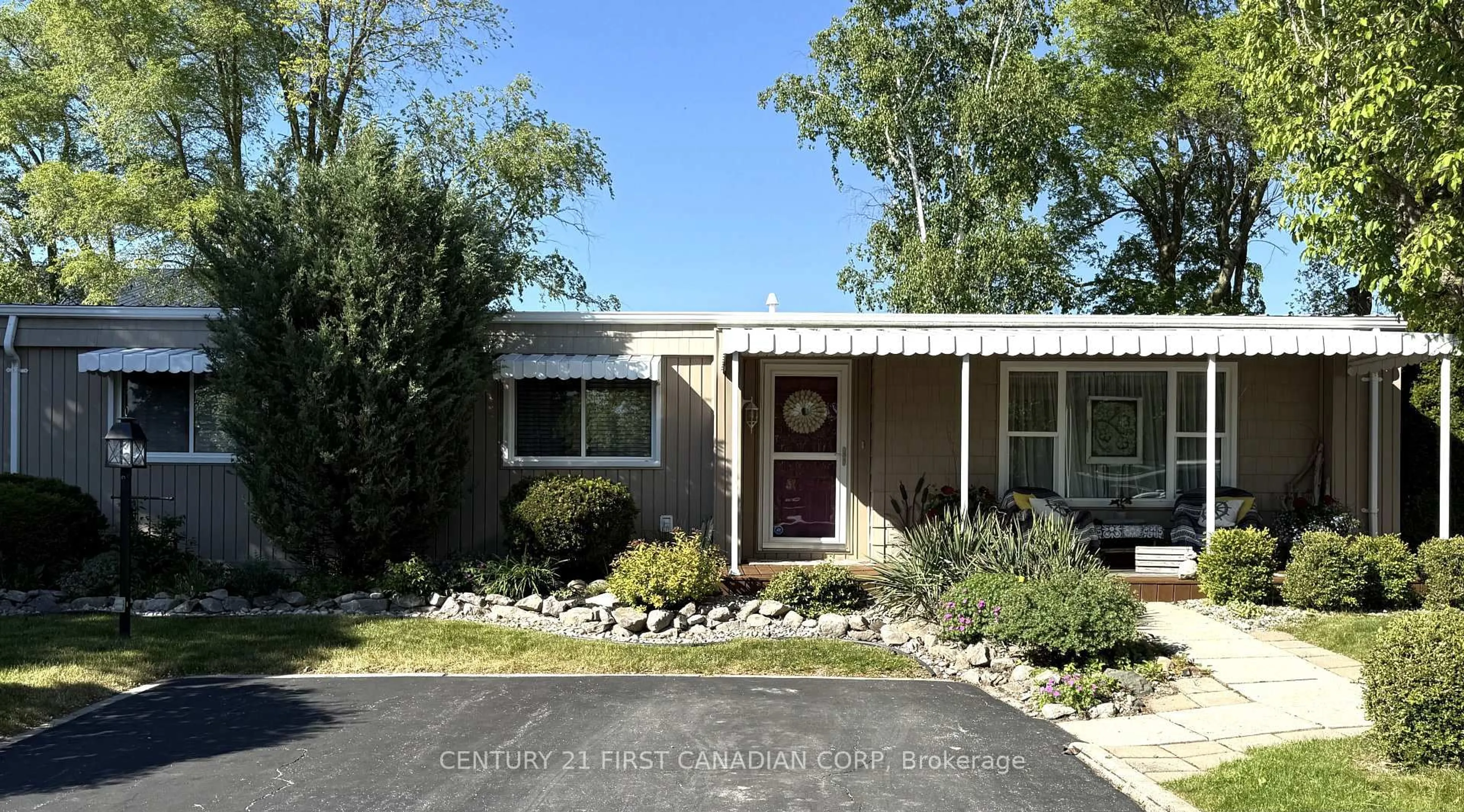 Home with vinyl exterior material, street for 29 Maple Grove Crt, South Huron Ontario N0M 1T0