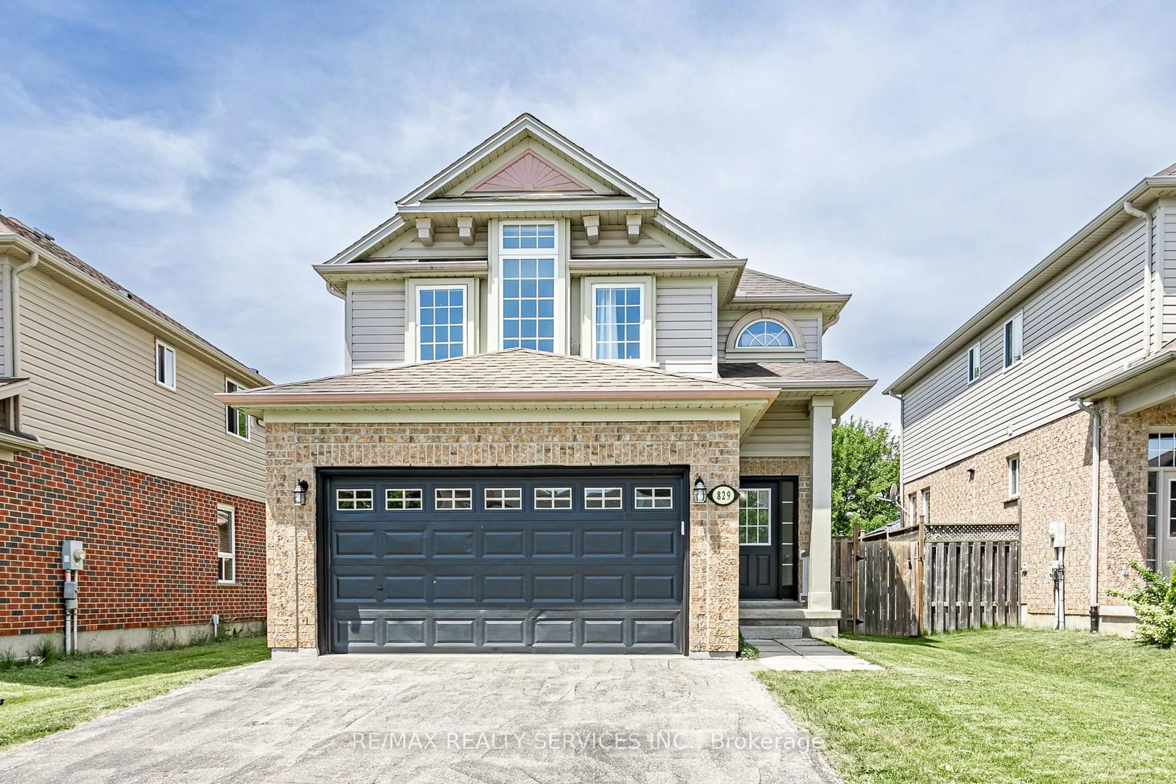 Home with brick exterior material, street for 829 Oakcrossing Rd, London North Ontario N6H 0A4