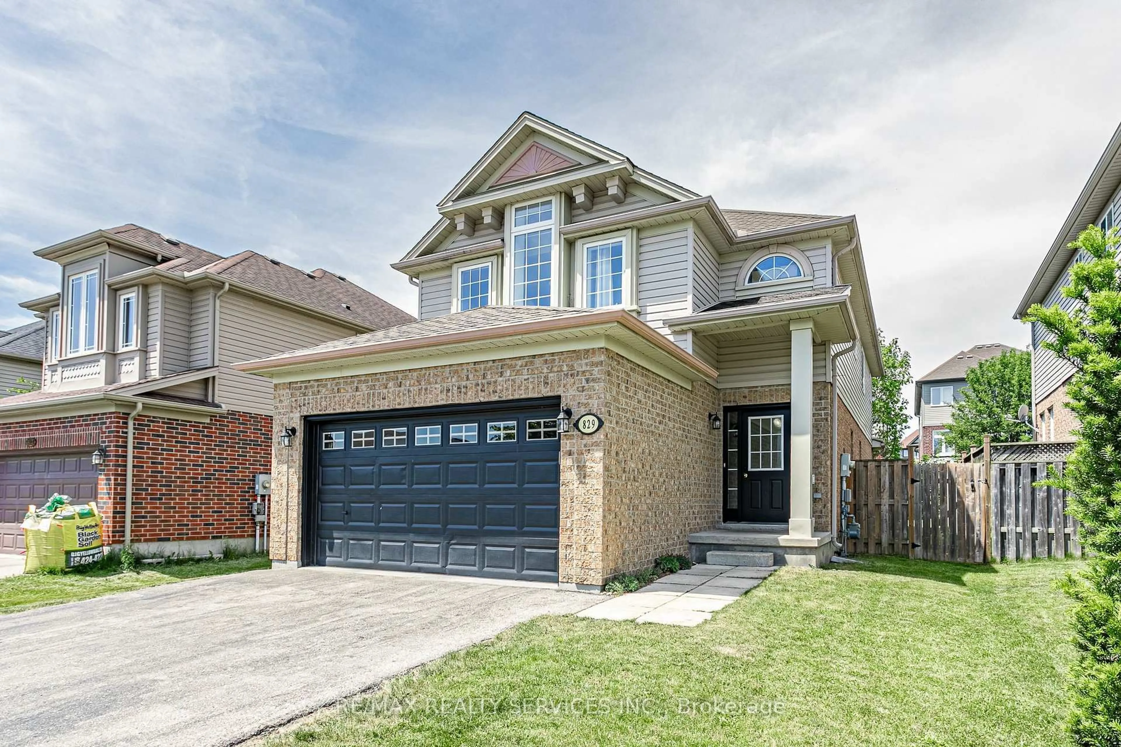 Home with brick exterior material, street for 829 Oakcrossing Rd, London North Ontario N6H 0A4