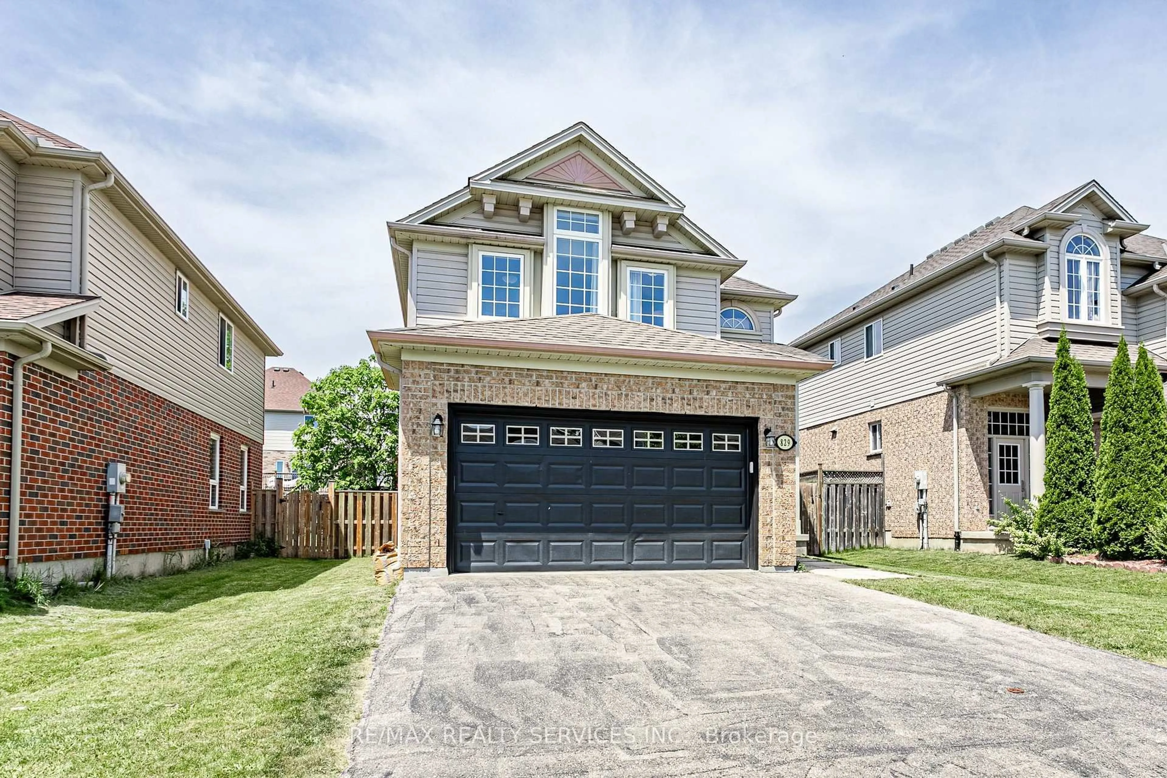 Home with brick exterior material, street for 829 Oakcrossing Rd, London North Ontario N6H 0A4