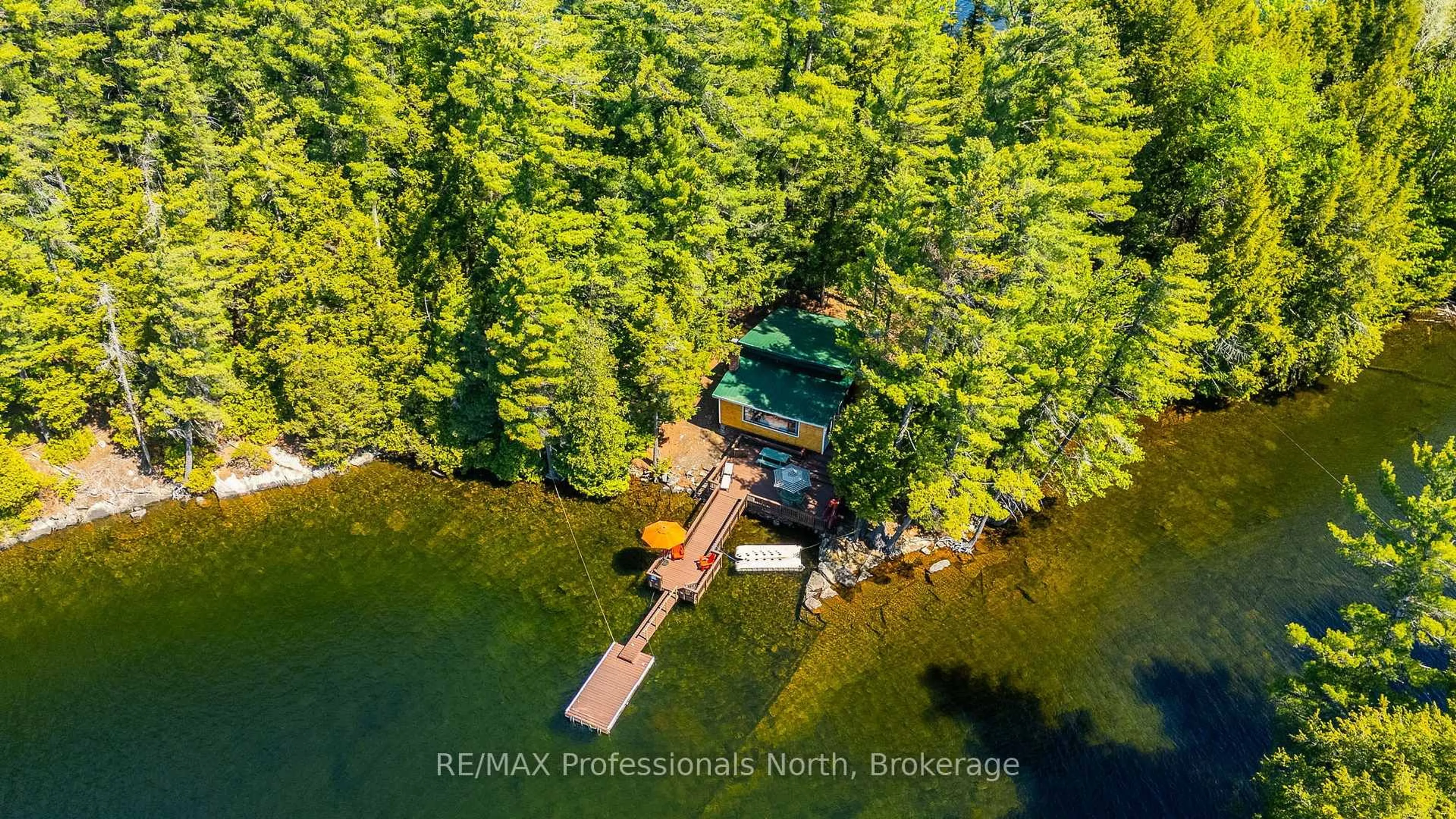 A pic from outside/outdoor area/front of a property/back of a property/a pic from drone, water/lake/river/ocean view for 12556 LITTLE HAWK - SOME DAY ISLE, Algonquin Highlands Ontario K0M 1J2