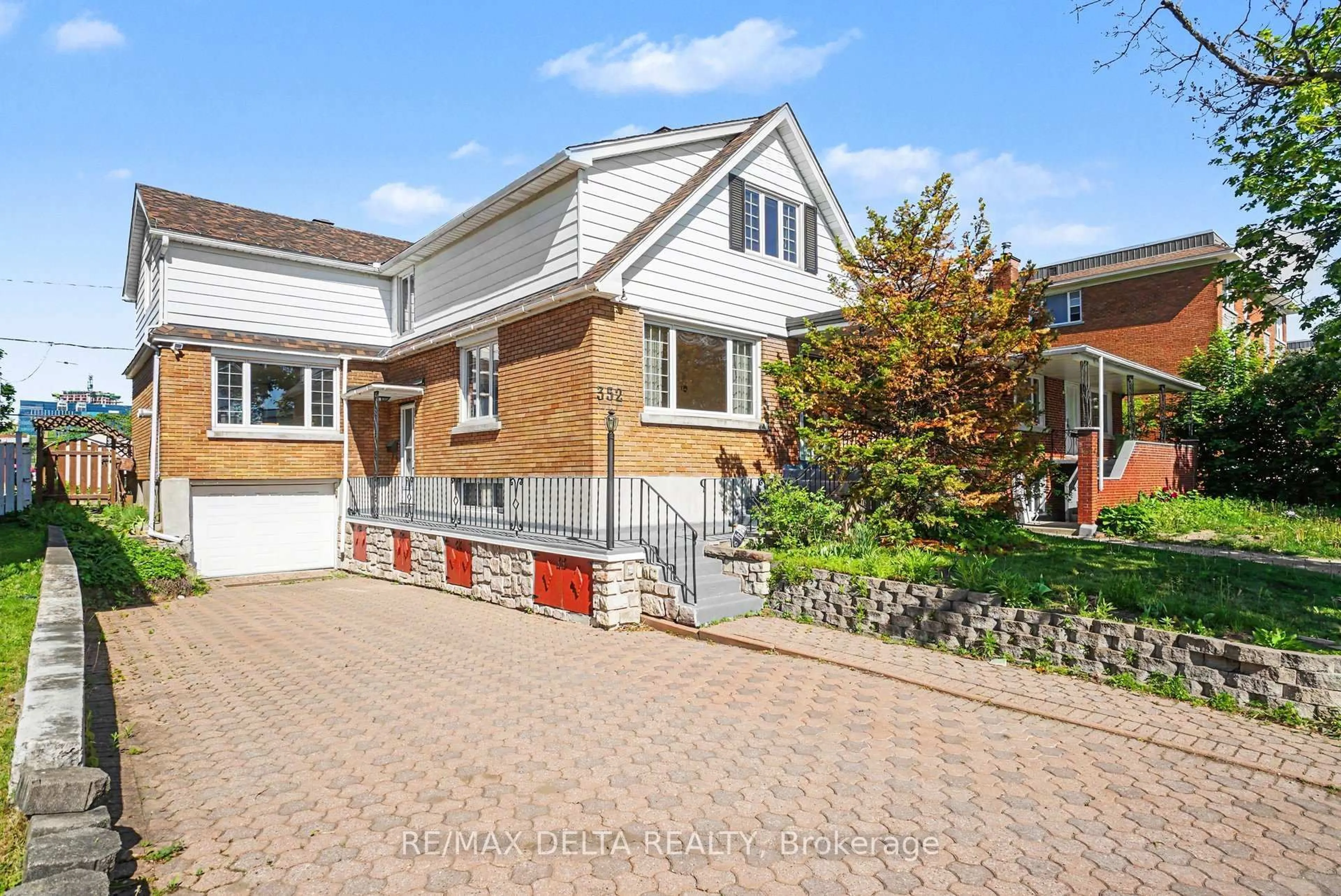 Home with brick exterior material, street for 352 Lacasse Ave, Ottawa Ontario K1L 7A9