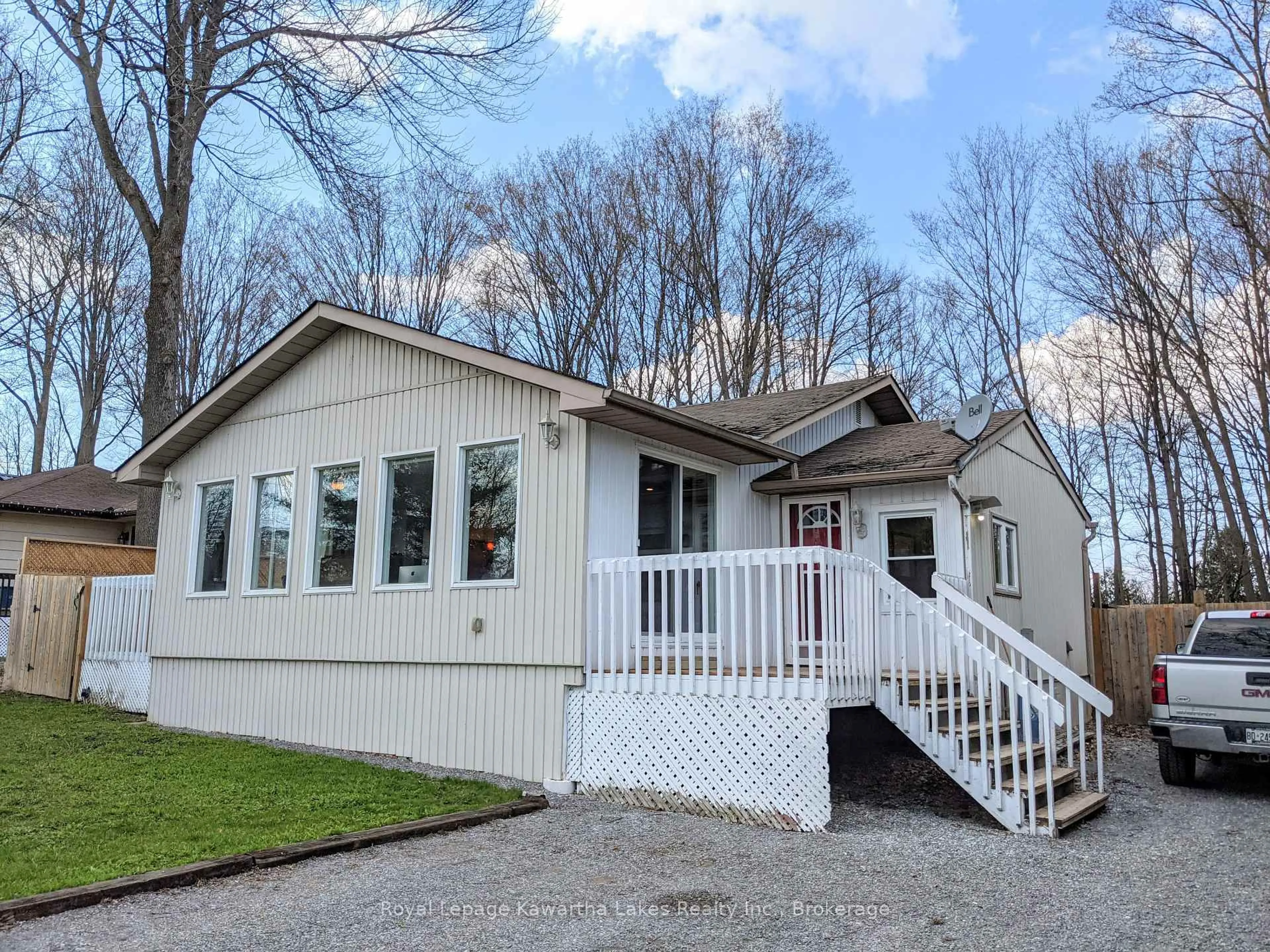 Home with vinyl exterior material, street for 21 Pleasure St, Kawartha Lakes Ontario K0M 1G0