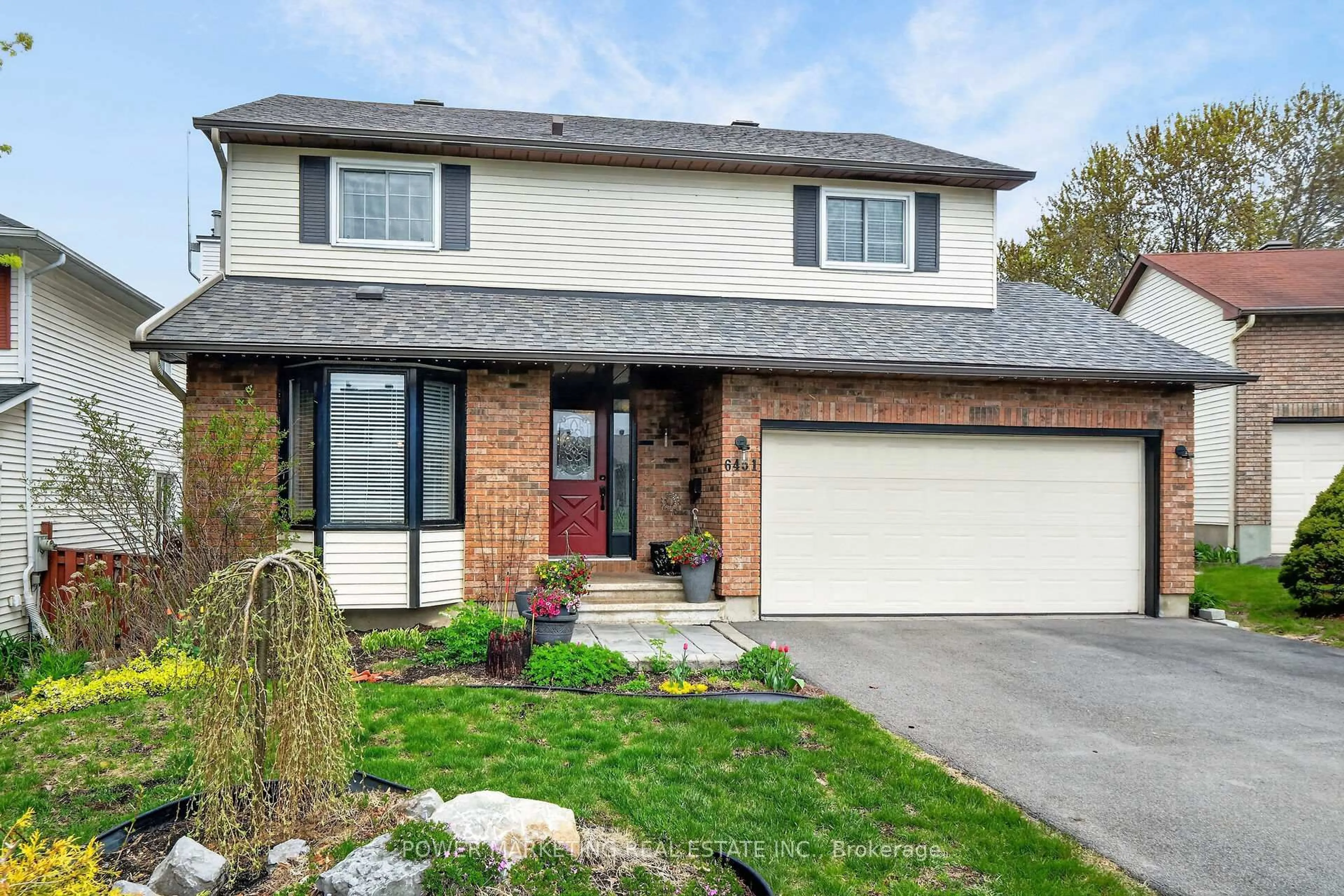 Home with brick exterior material, street for 6451 VISENEAU Dr, Orleans Ontario K1C 5H1
