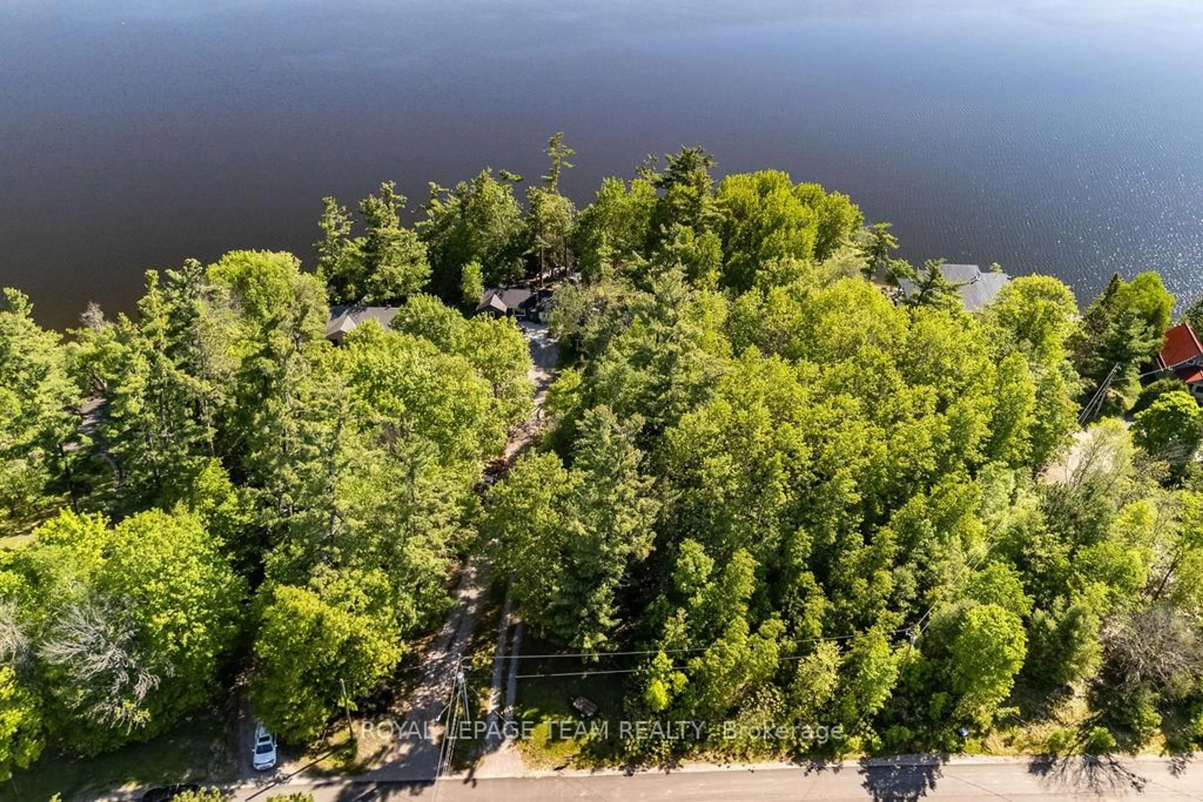 A pic from outside/outdoor area/front of a property/back of a property/a pic from drone, water/lake/river/ocean view for 7 Simmons Dr, Cobden Ontario K0J 1K0