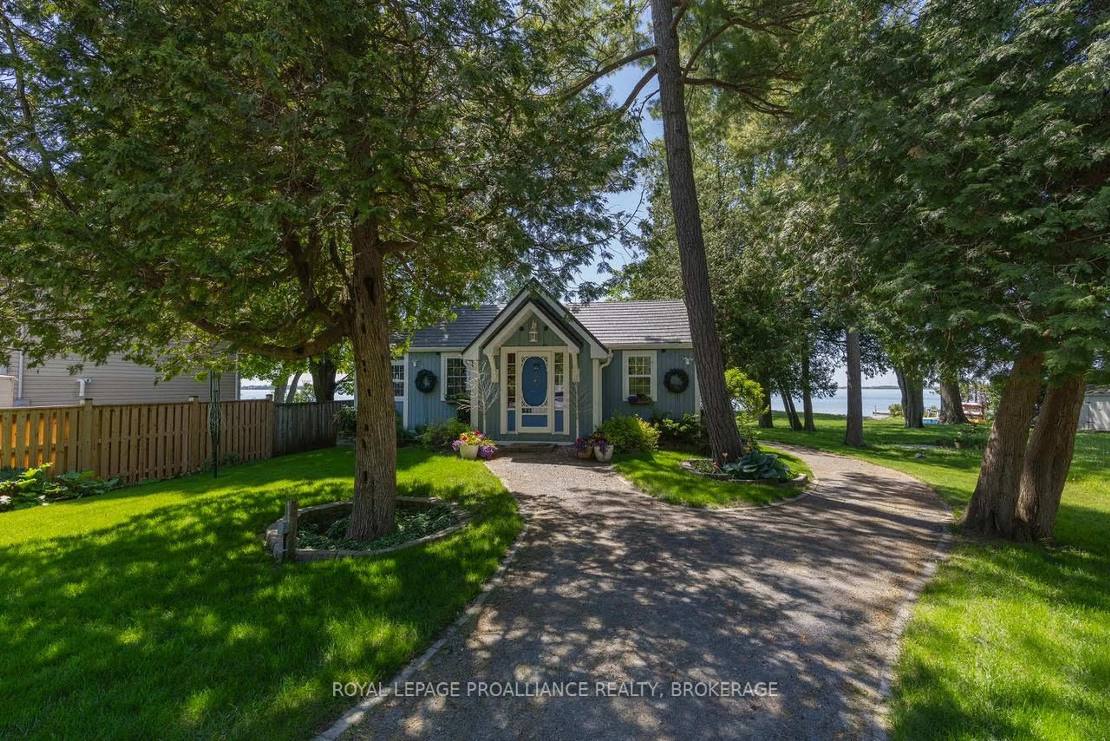 A pic from outside/outdoor area/front of a property/back of a property/a pic from drone, water/lake/river/ocean view for 138 Nicholson Point Rd, Bath Ontario K0H 1G0