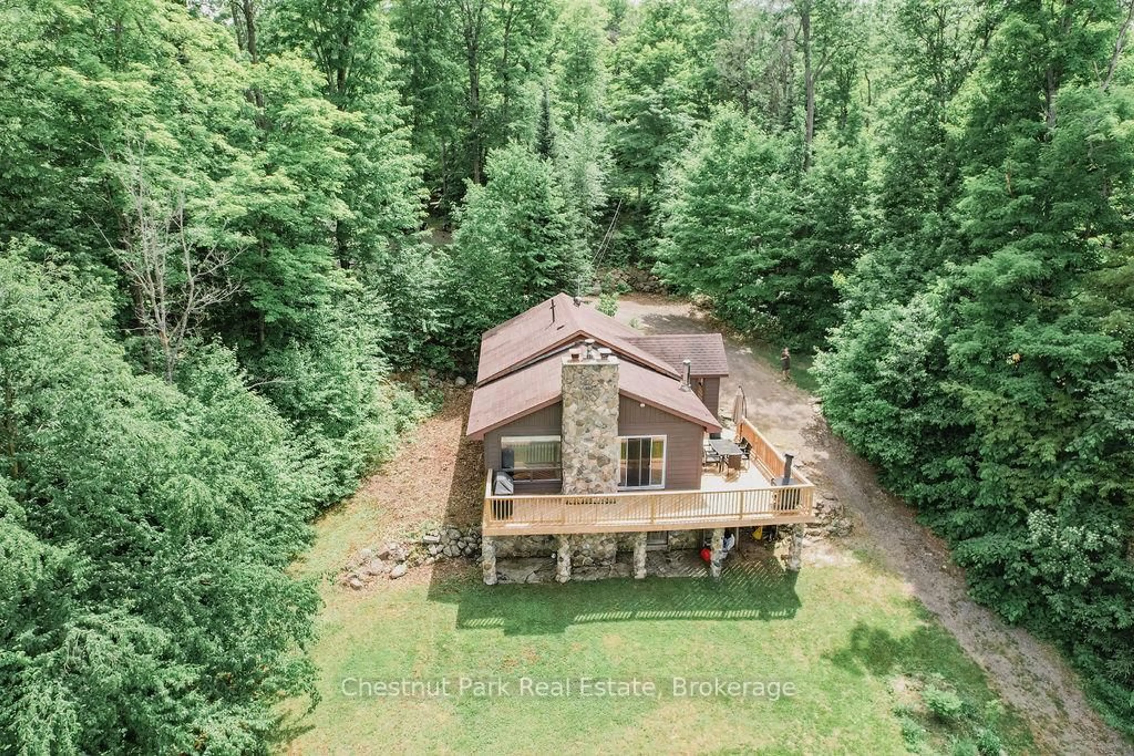 A pic from outside/outdoor area/front of a property/back of a property/a pic from drone, forest/trees view for 893 Relative Rd, Armour Ontario P0A 1C0