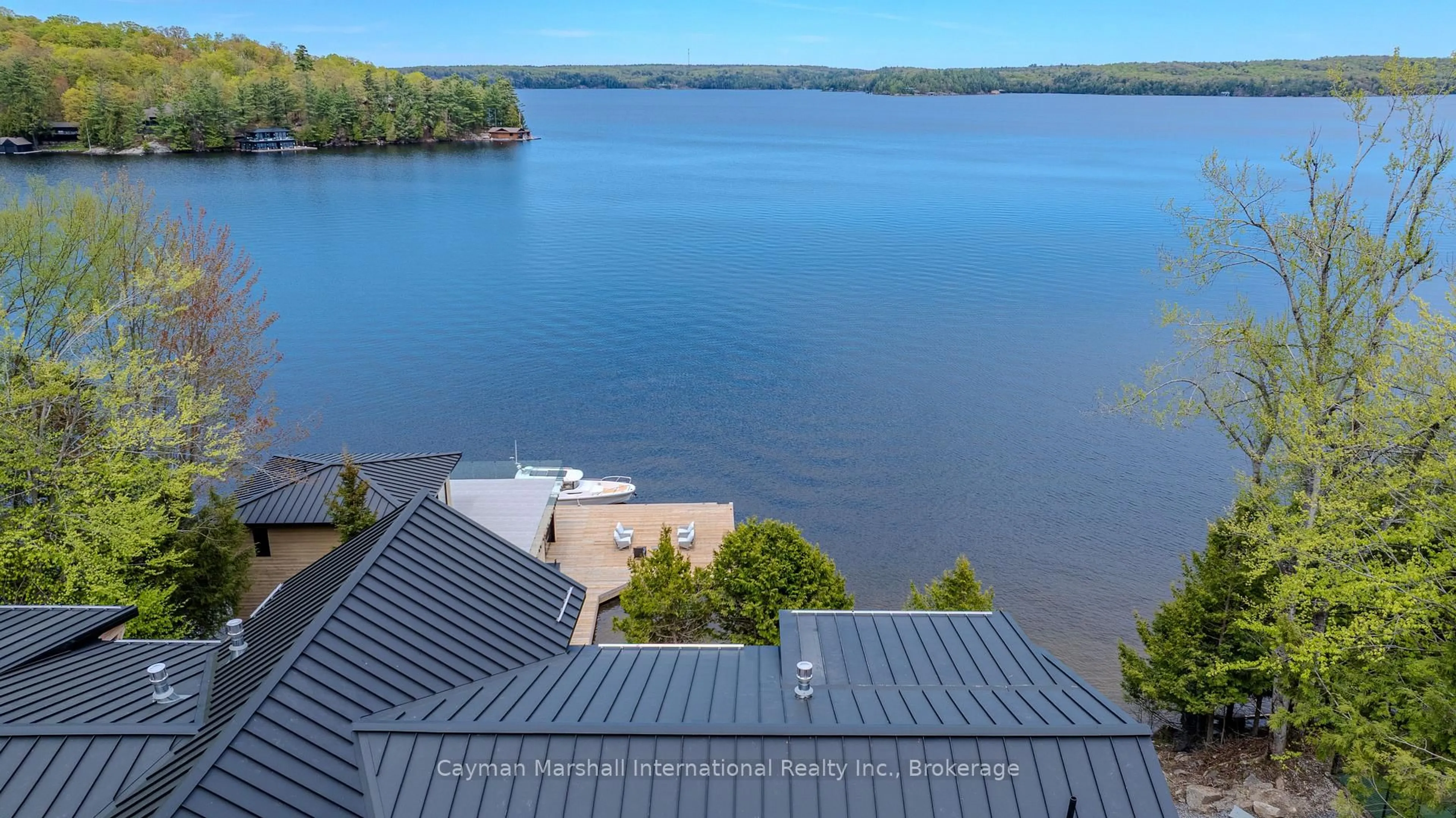 A pic from outside/outdoor area/front of a property/back of a property/a pic from drone, water/lake/river/ocean view for 1405 Juddhaven Rd Rd #32, Muskoka Lakes Ontario P0B 1J0