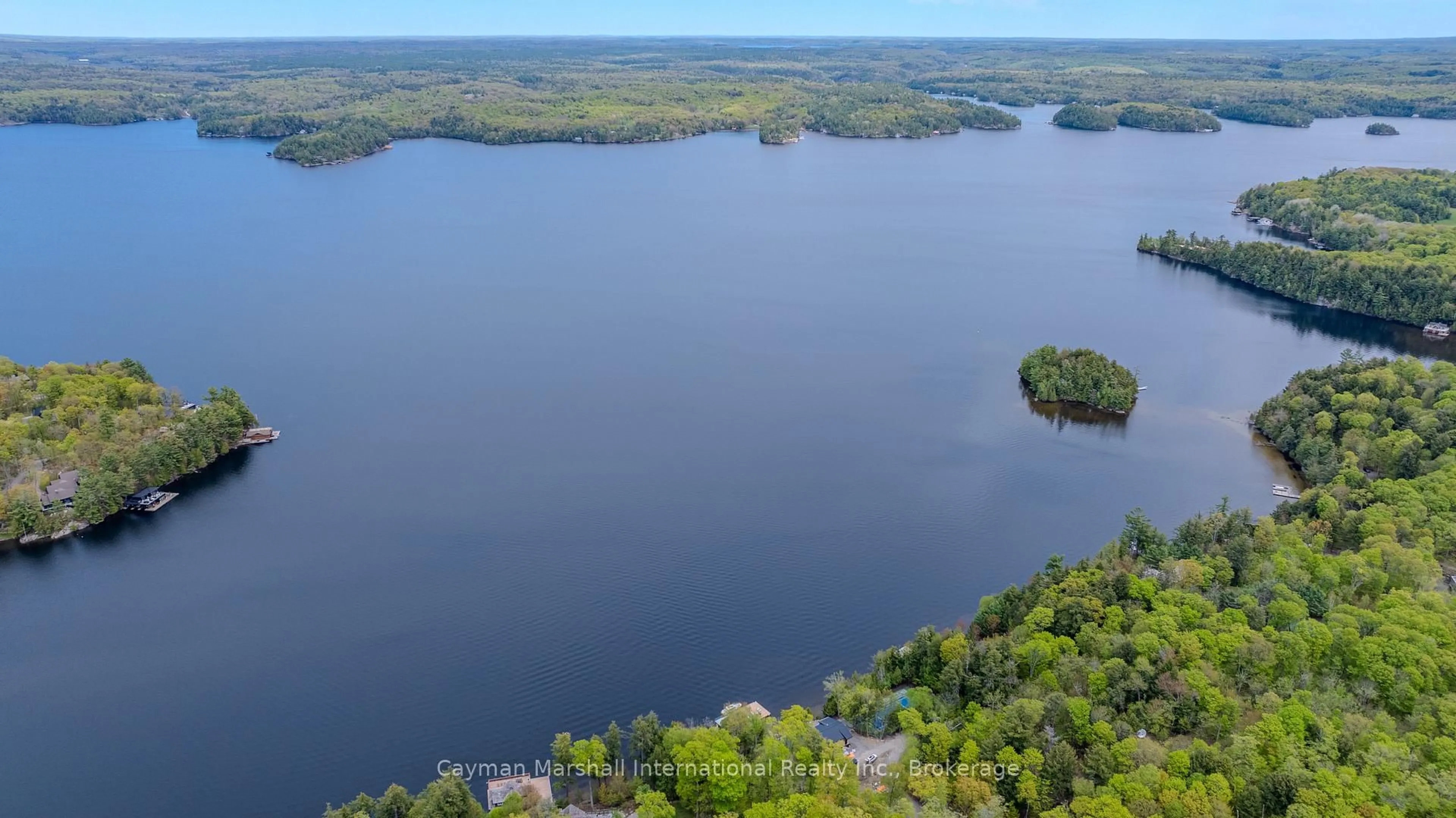 A pic from outside/outdoor area/front of a property/back of a property/a pic from drone, water/lake/river/ocean view for 1405 Juddhaven Rd Rd #32, Muskoka Lakes Ontario P0B 1J0
