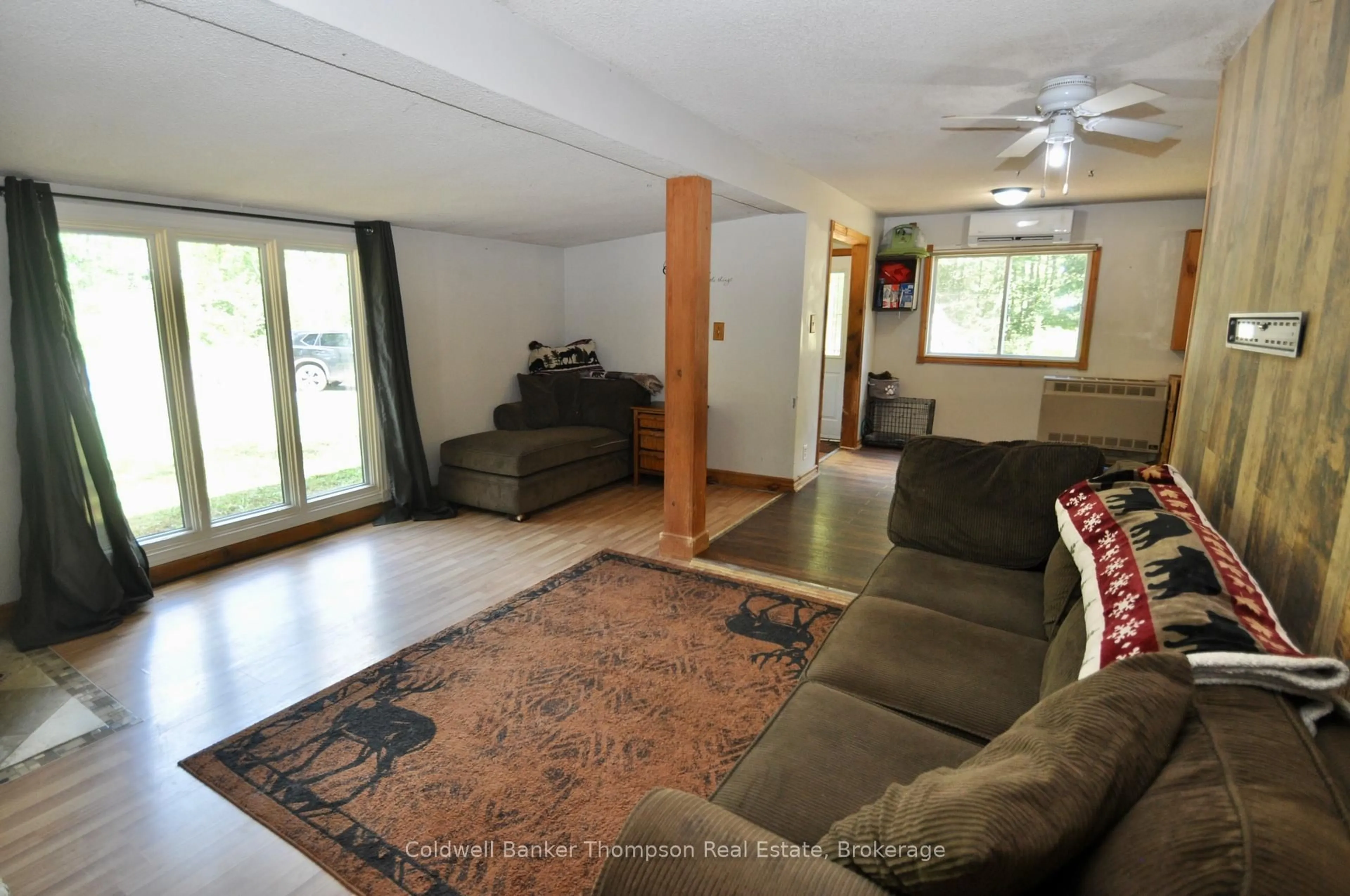 Living room with furniture, unknown for 31 Hutcheson Beach Rd, Huntsville Ontario P1H 1N4