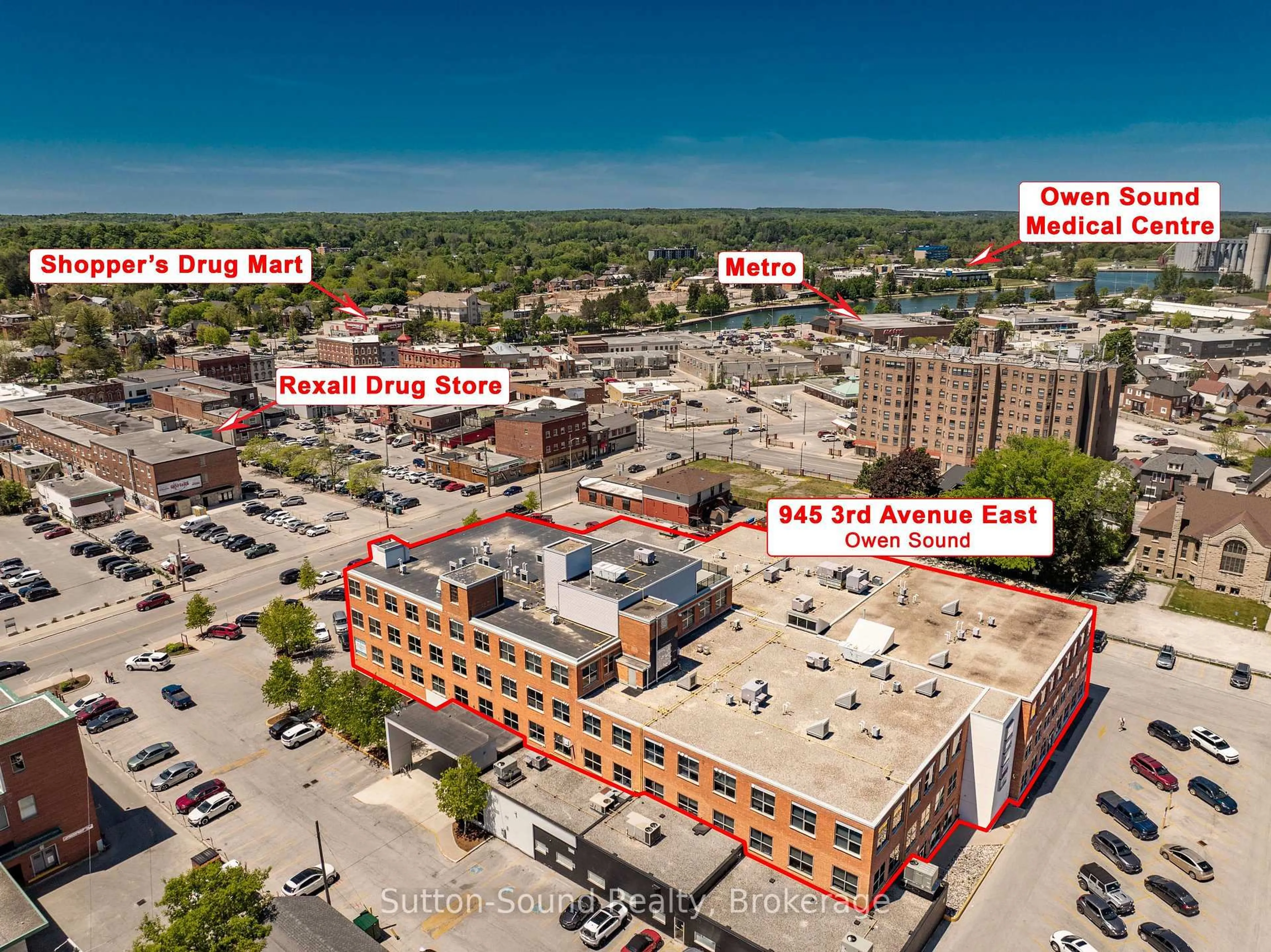 A pic from outside/outdoor area/front of a property/back of a property/a pic from drone, building for 945 3rd Ave #303, Owen Sound Ontario N4K 2K8