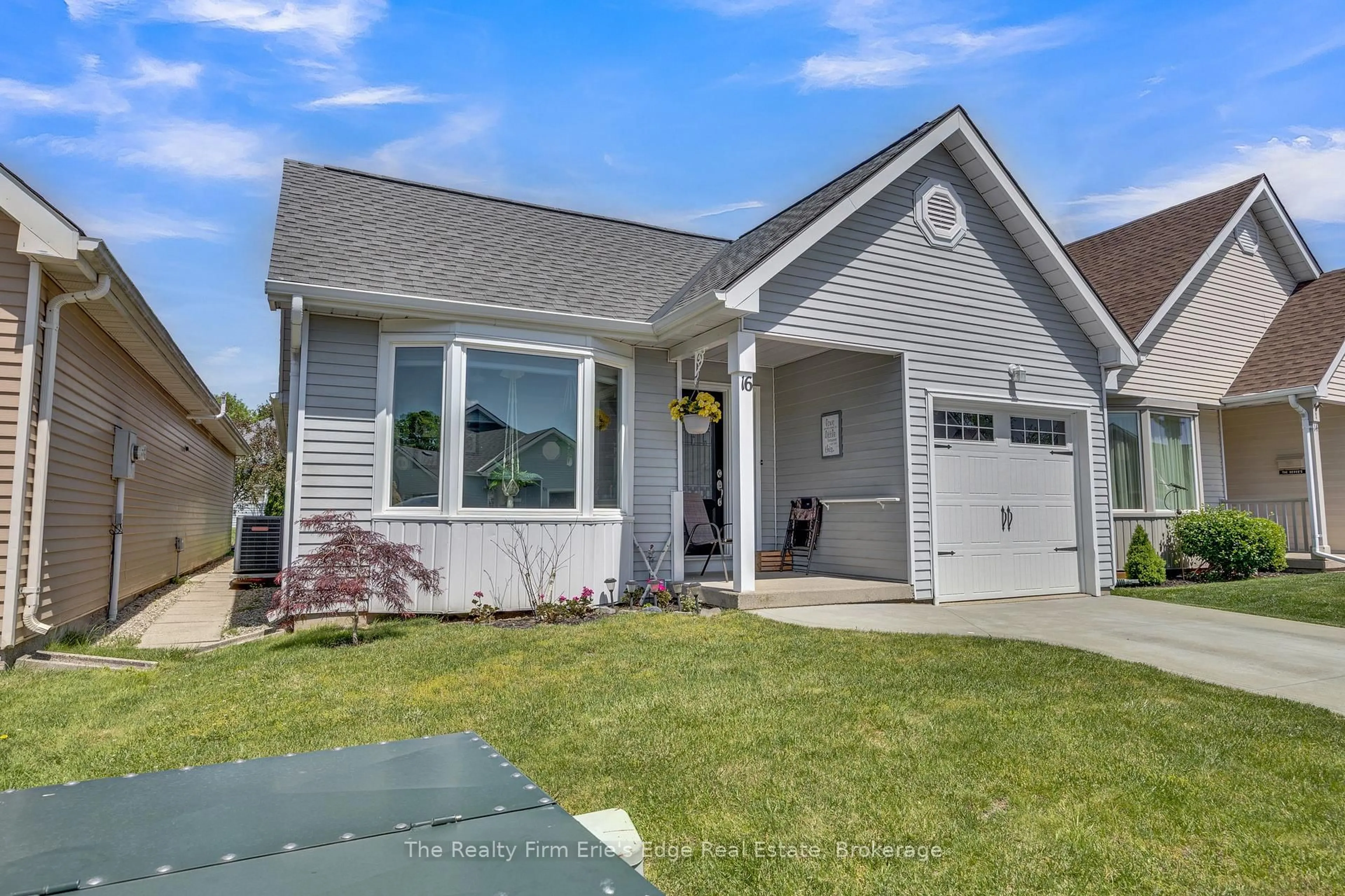 Home with vinyl exterior material, street for 16 Hawkins Cres, Tillsonburg Ontario N4G 5K7