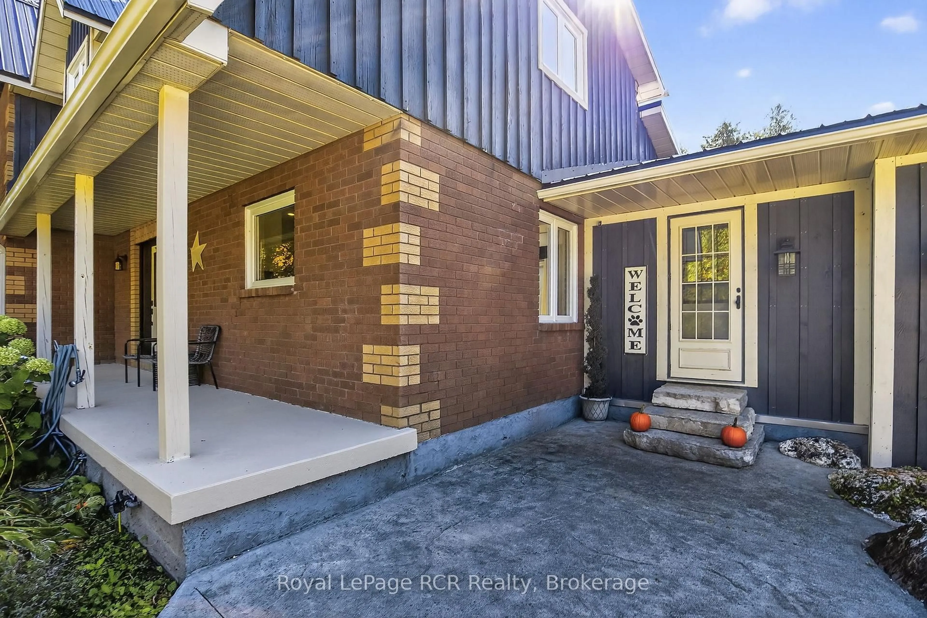 Home with brick exterior material, street for 468080 Concession 12B Concession, Grey Highlands Ontario N0C 1C0