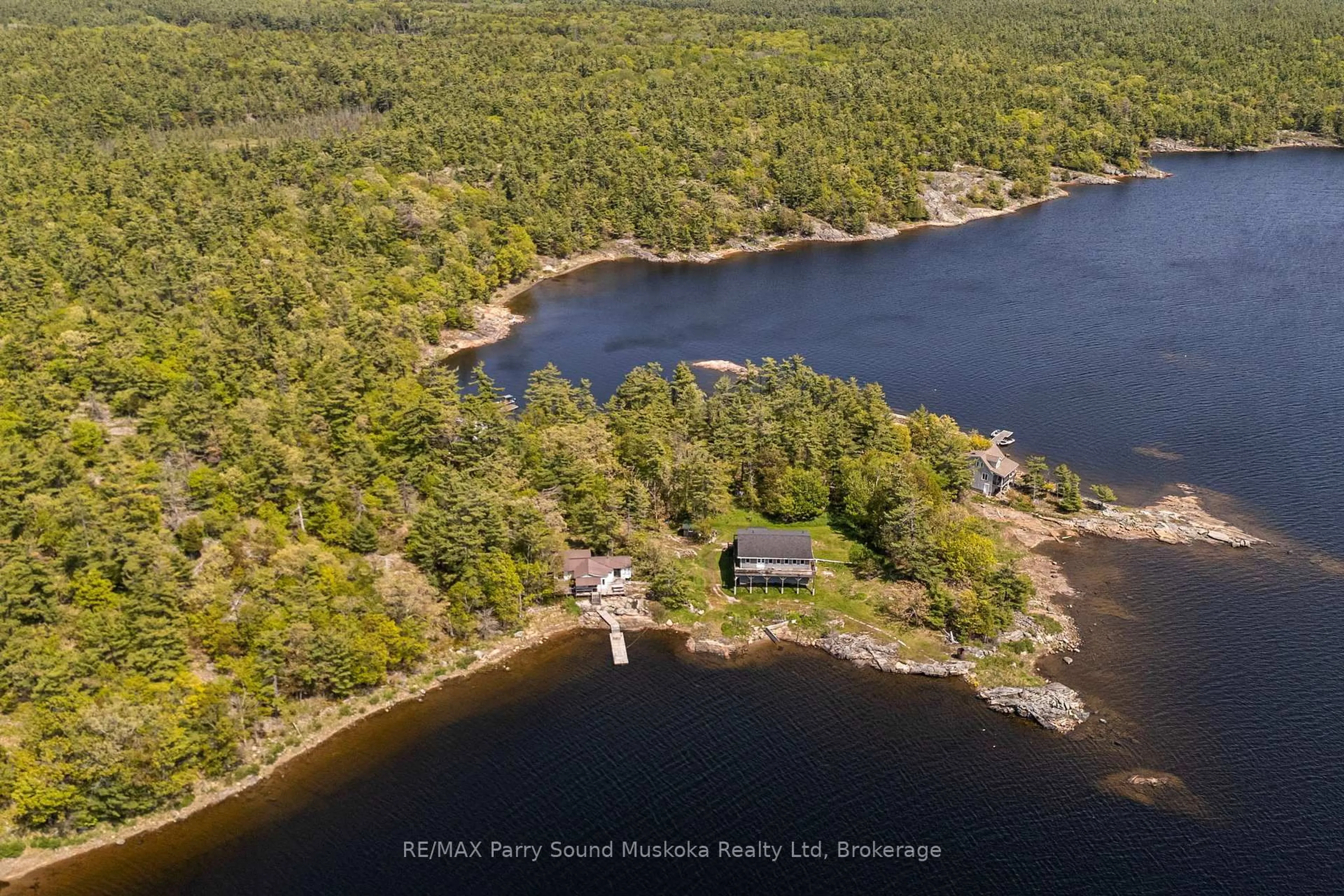 A pic from outside/outdoor area/front of a property/back of a property/a pic from drone, water/lake/river/ocean view for 16 B55 Island Island, The Archipelago Ontario P0C 1H0