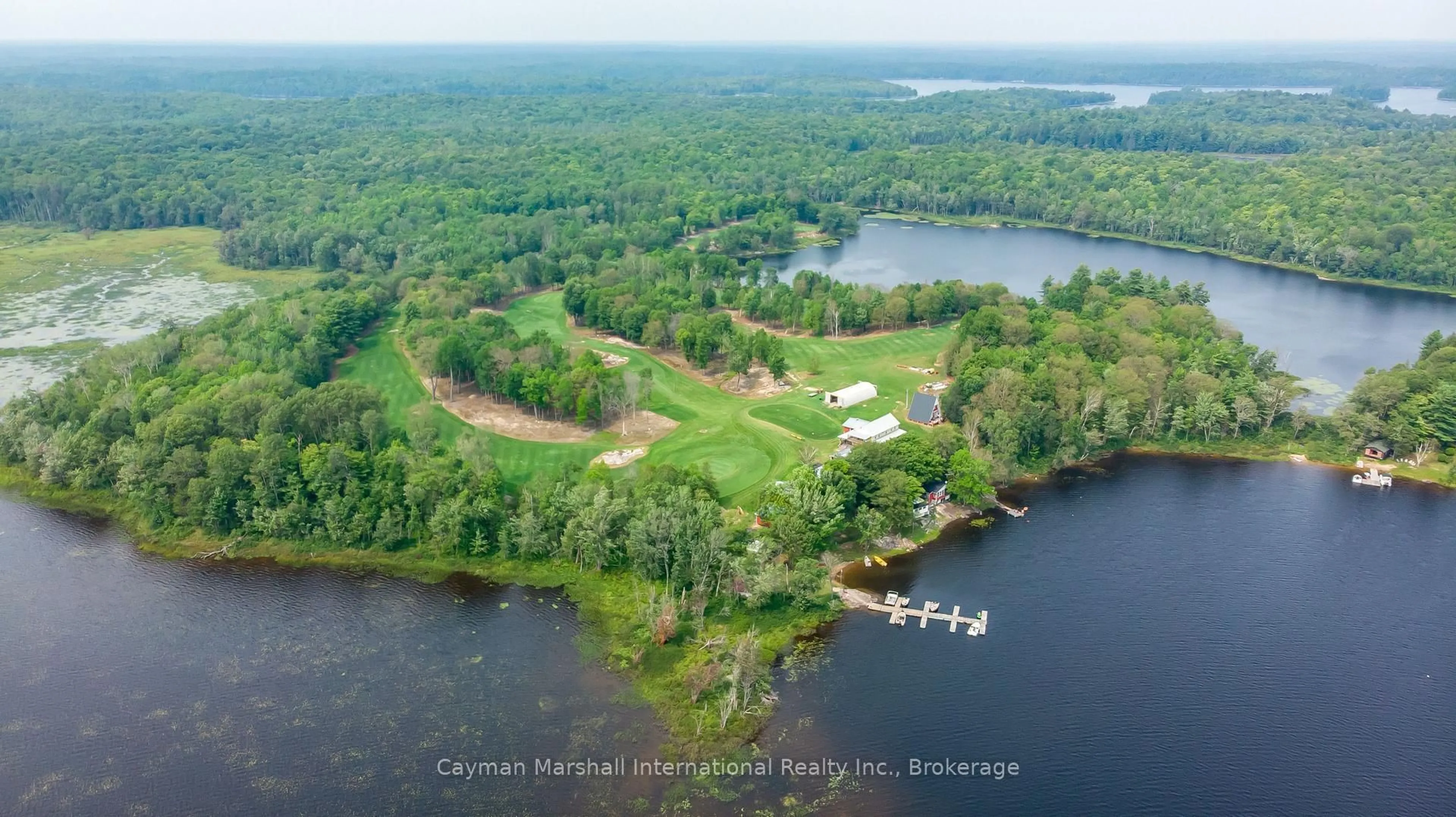 A pic from outside/outdoor area/front of a property/back of a property/a pic from drone, water/lake/river/ocean view for 22341 Wahwashkesh Lake Rd, Whitestone Ontario P0A 1G0
