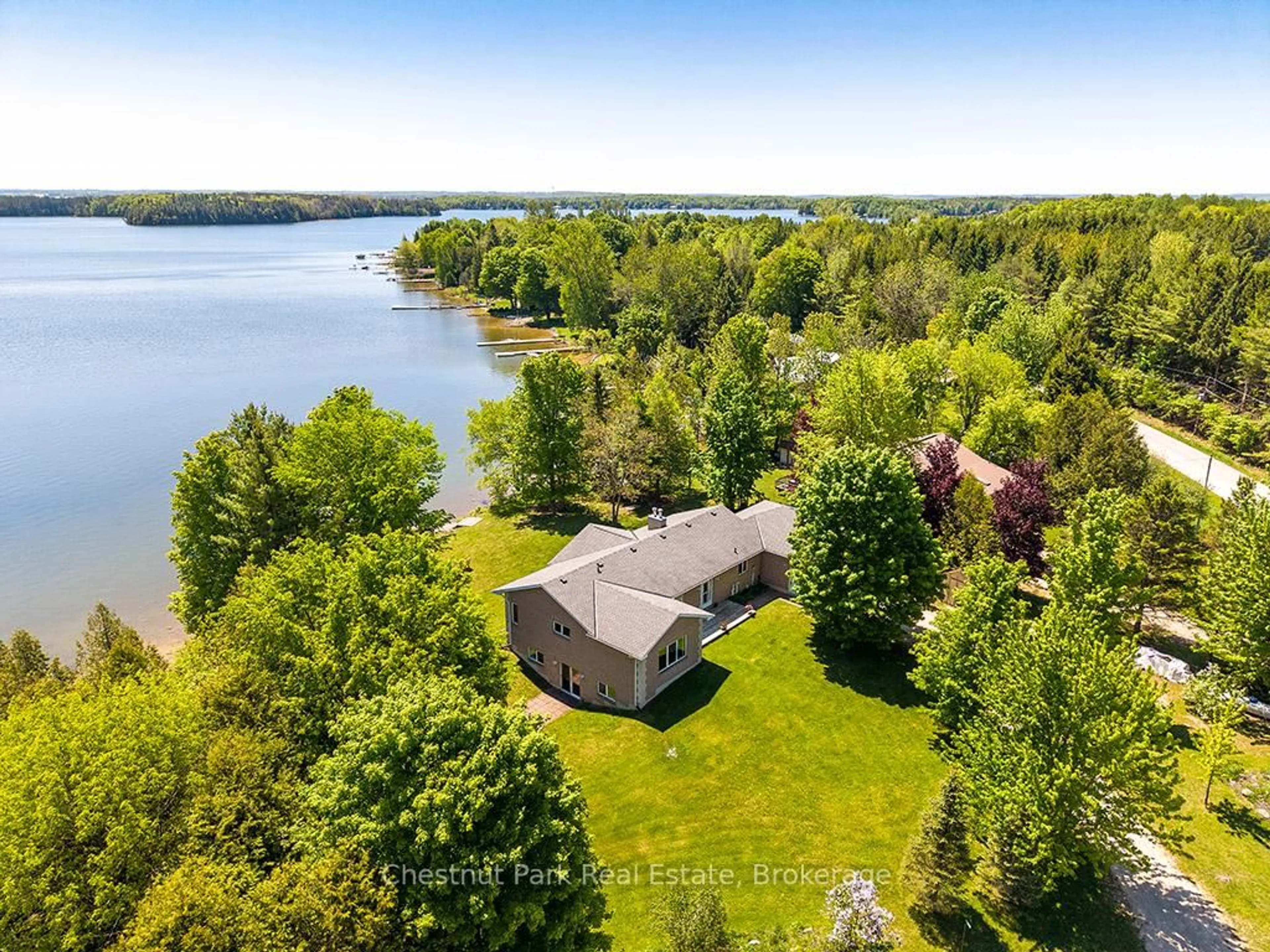 A pic from outside/outdoor area/front of a property/back of a property/a pic from drone, water/lake/river/ocean view for 189 Point Rd, Grey Highlands Ontario N0C 1E0