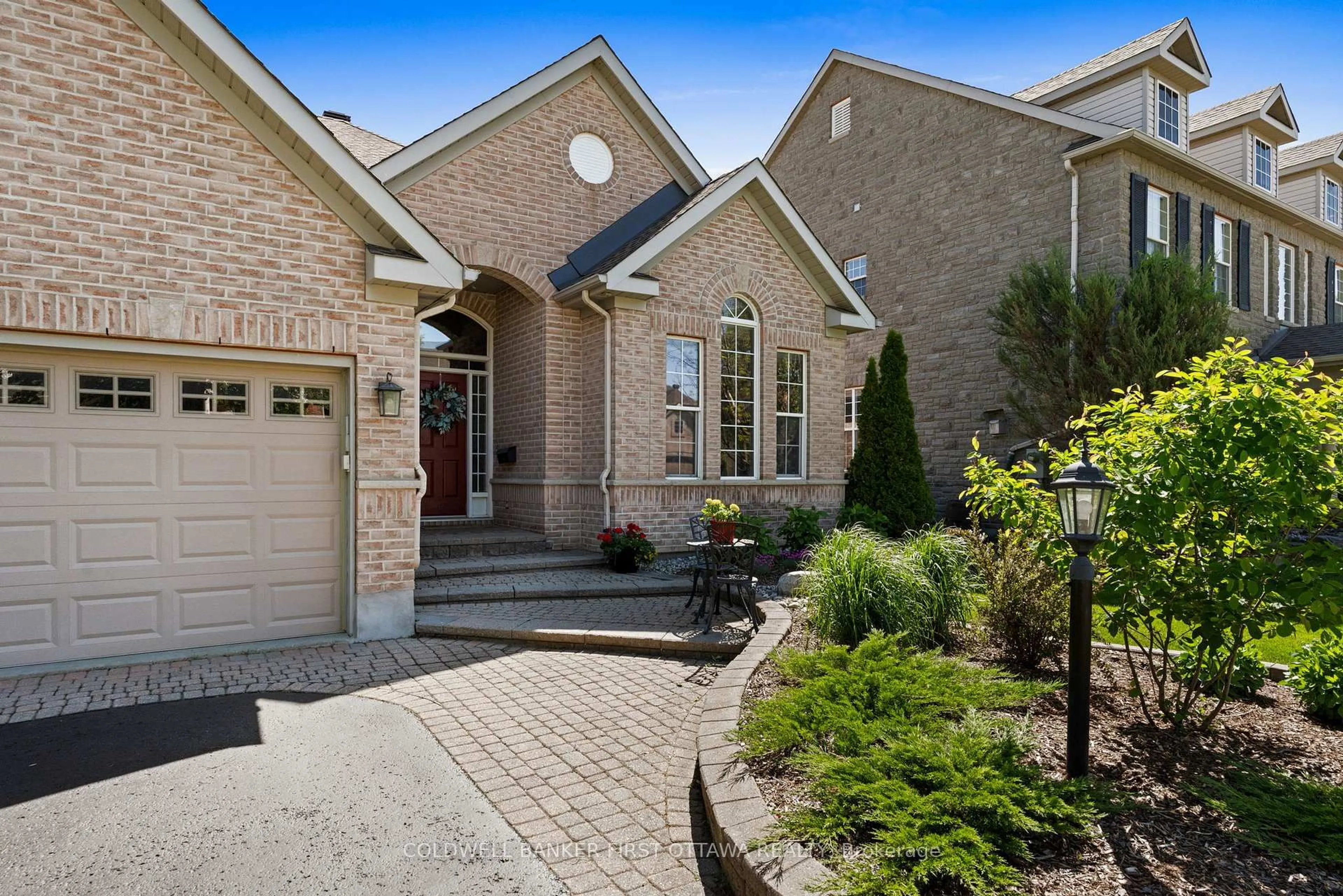 Home with brick exterior material, street for 19 Fencerow Way, Nepean Ontario K2J 4X8