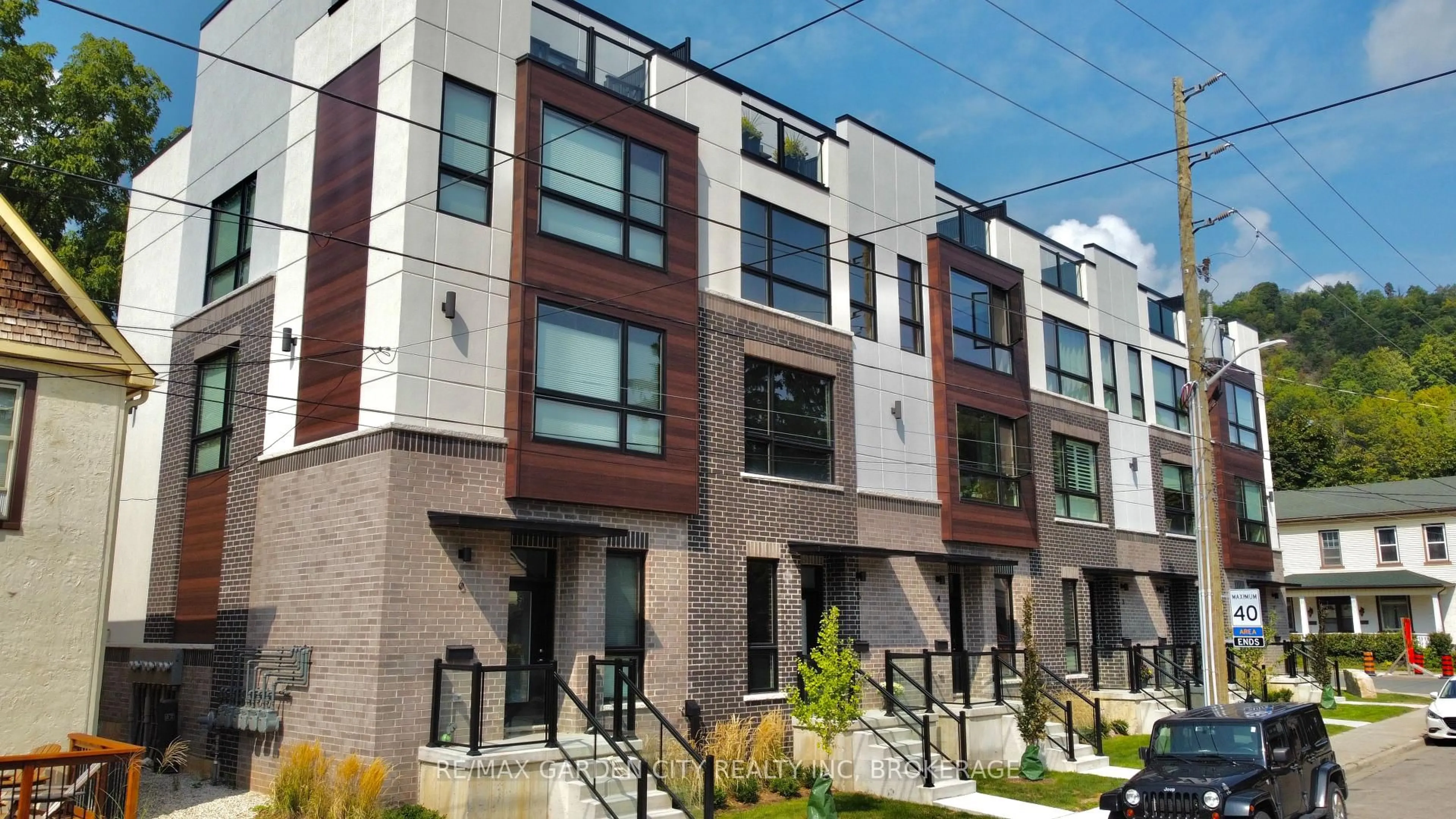 Home with brick exterior material, street for 2 BROCK St #5, Hamilton Ontario L9H 3G6